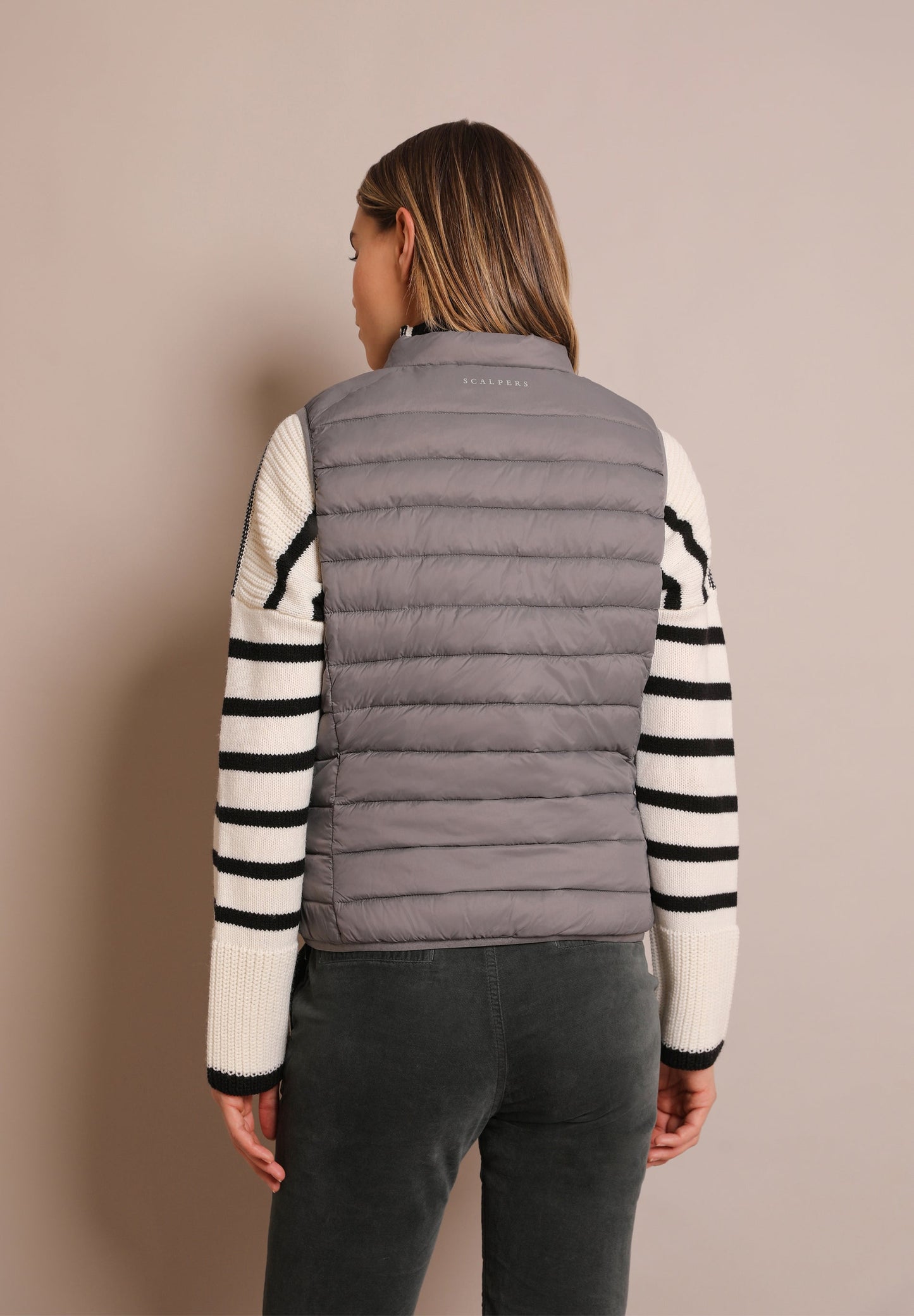 QUILTED GILET WITH SKULL DETAIL