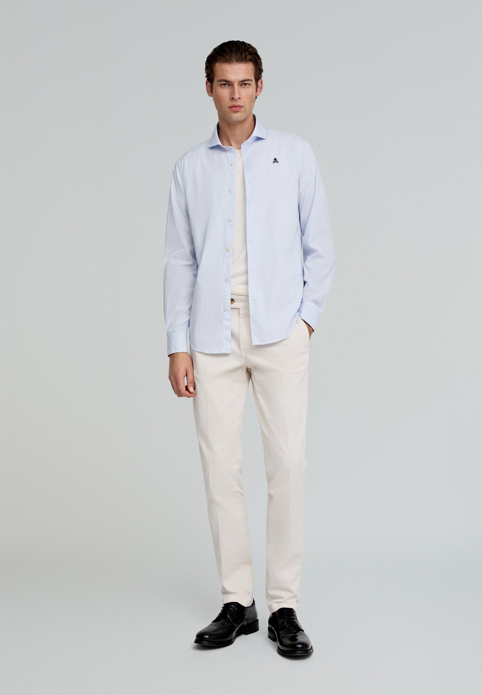 PLEATED CHINO TROUSERS