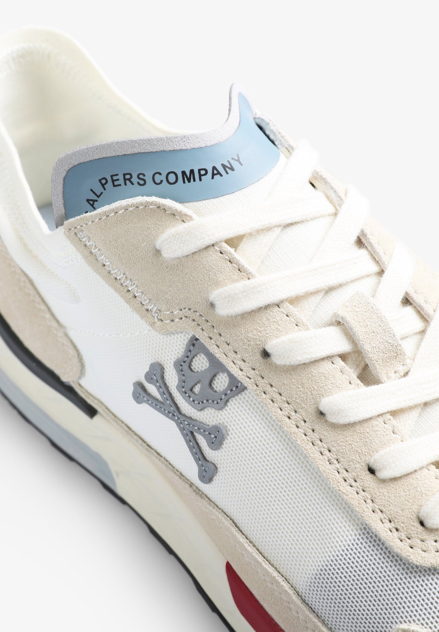 SNEAKERS WITH SUEDE SKULL DETAILS