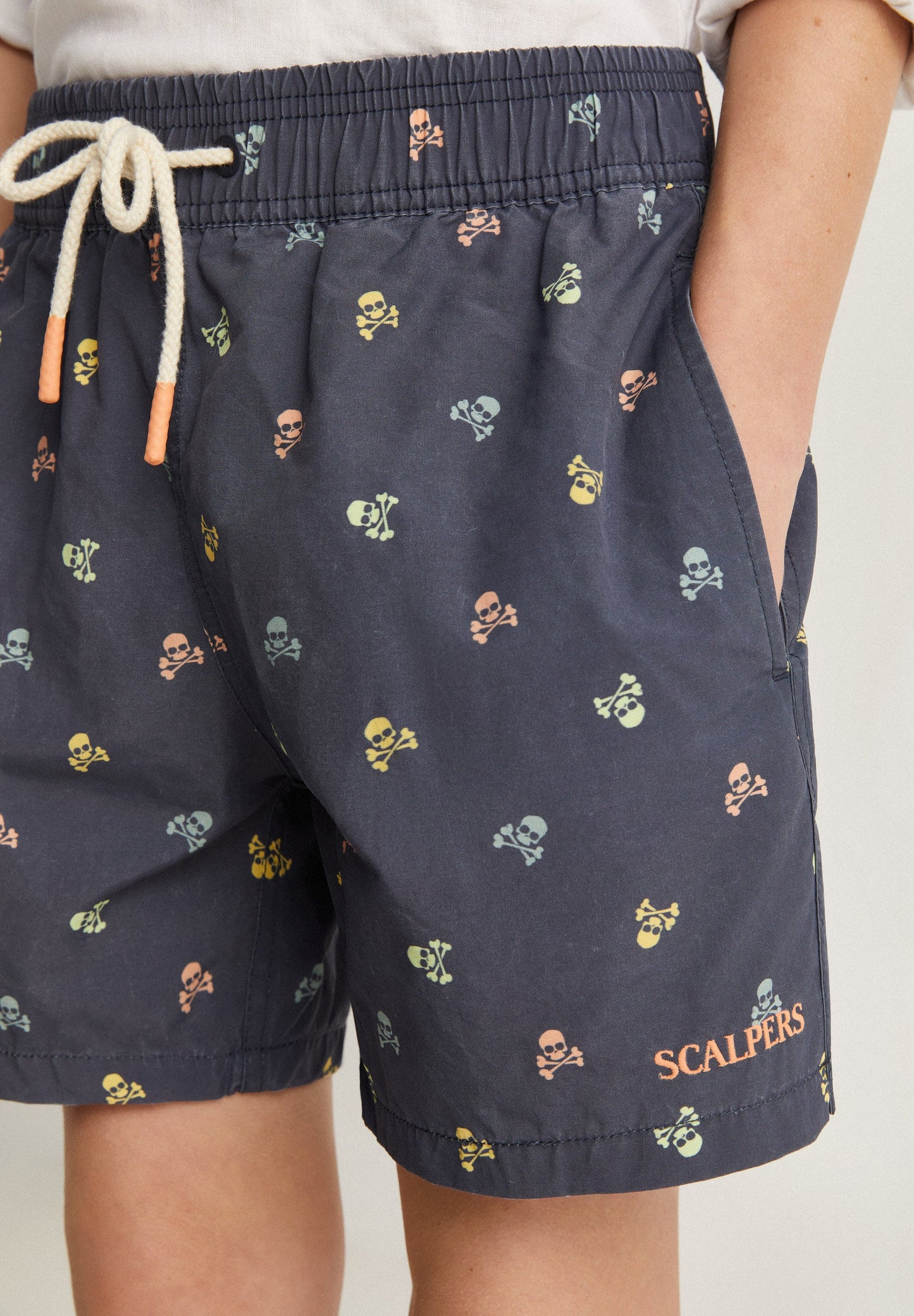 SWIMMING TRUNKS WITH ALL-OVER CONTRAST SKULLS