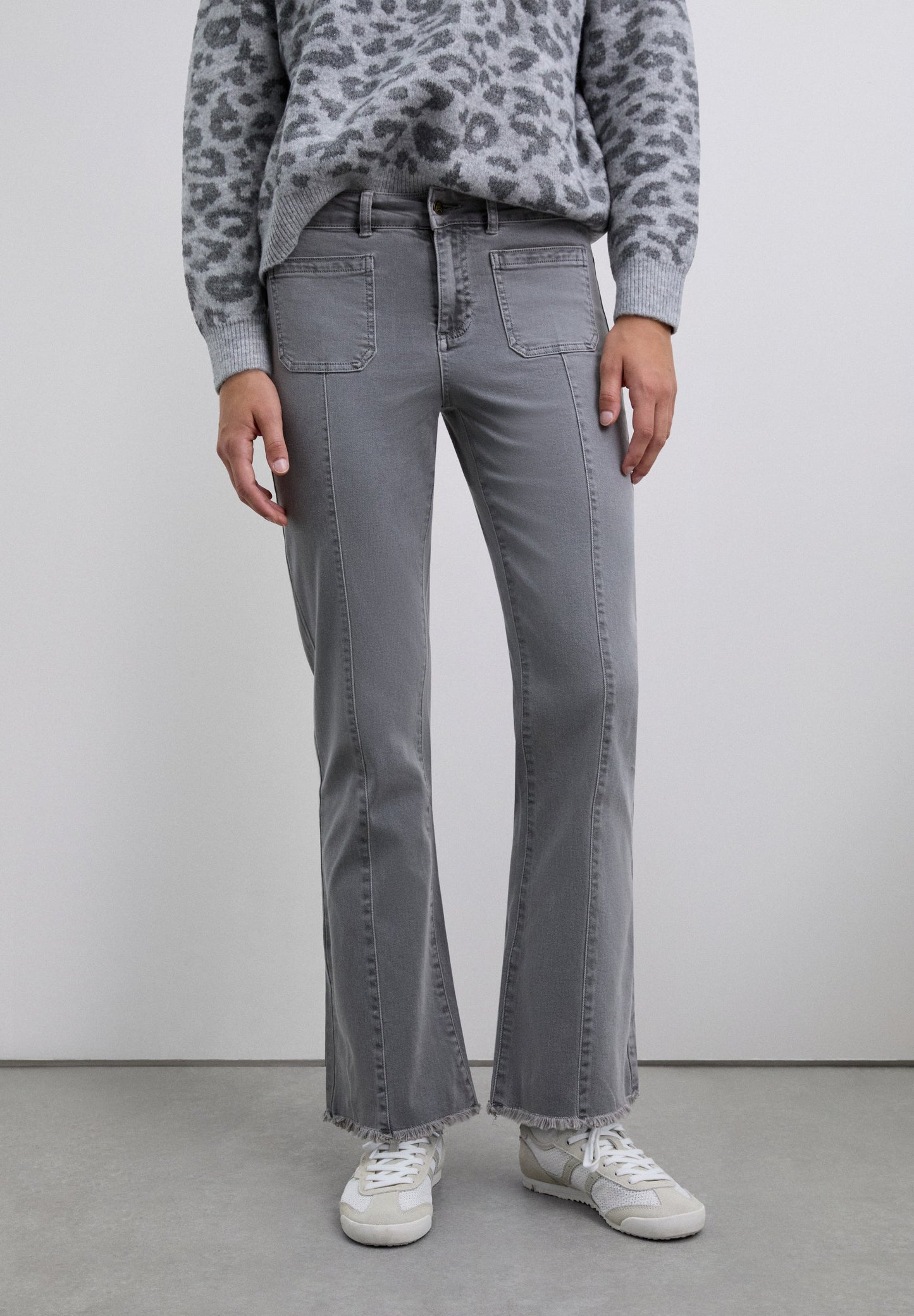 FLARED TROUSERS WITH FRINGING