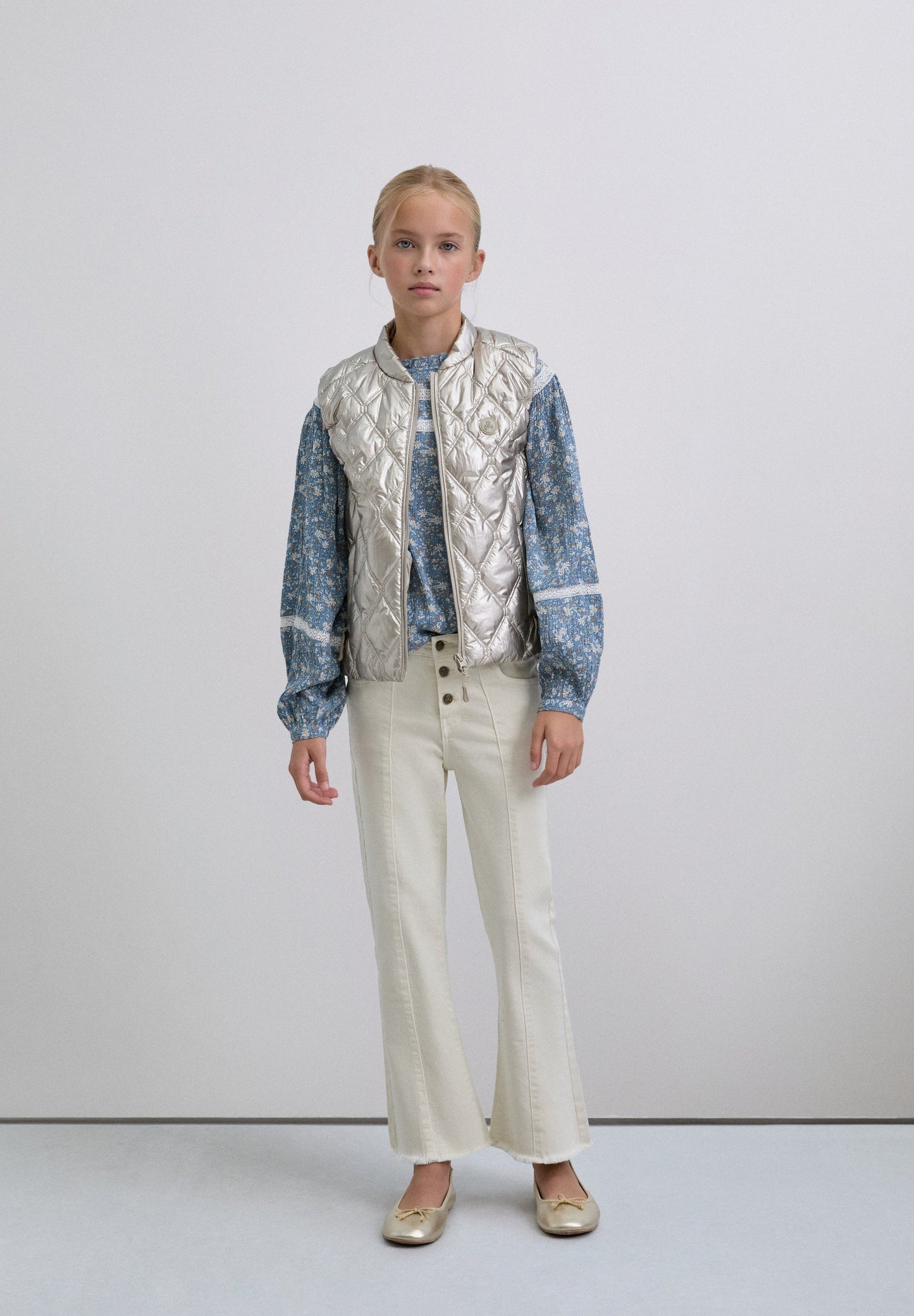 PUFFER VEST WITH SKULL