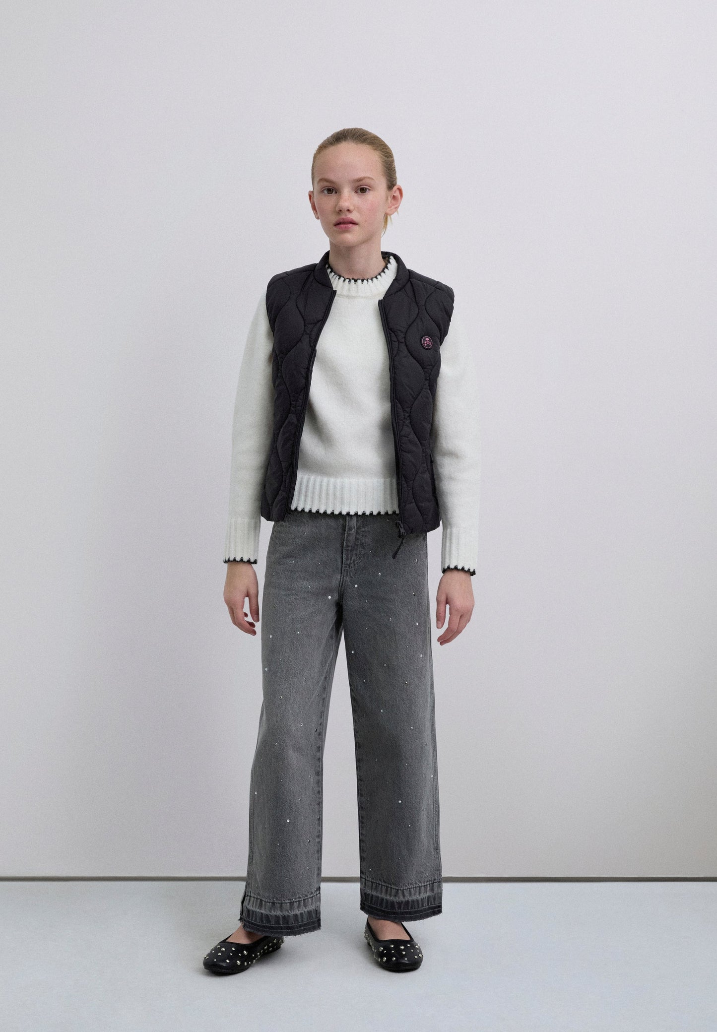 PUFFER VEST WITH SKULL