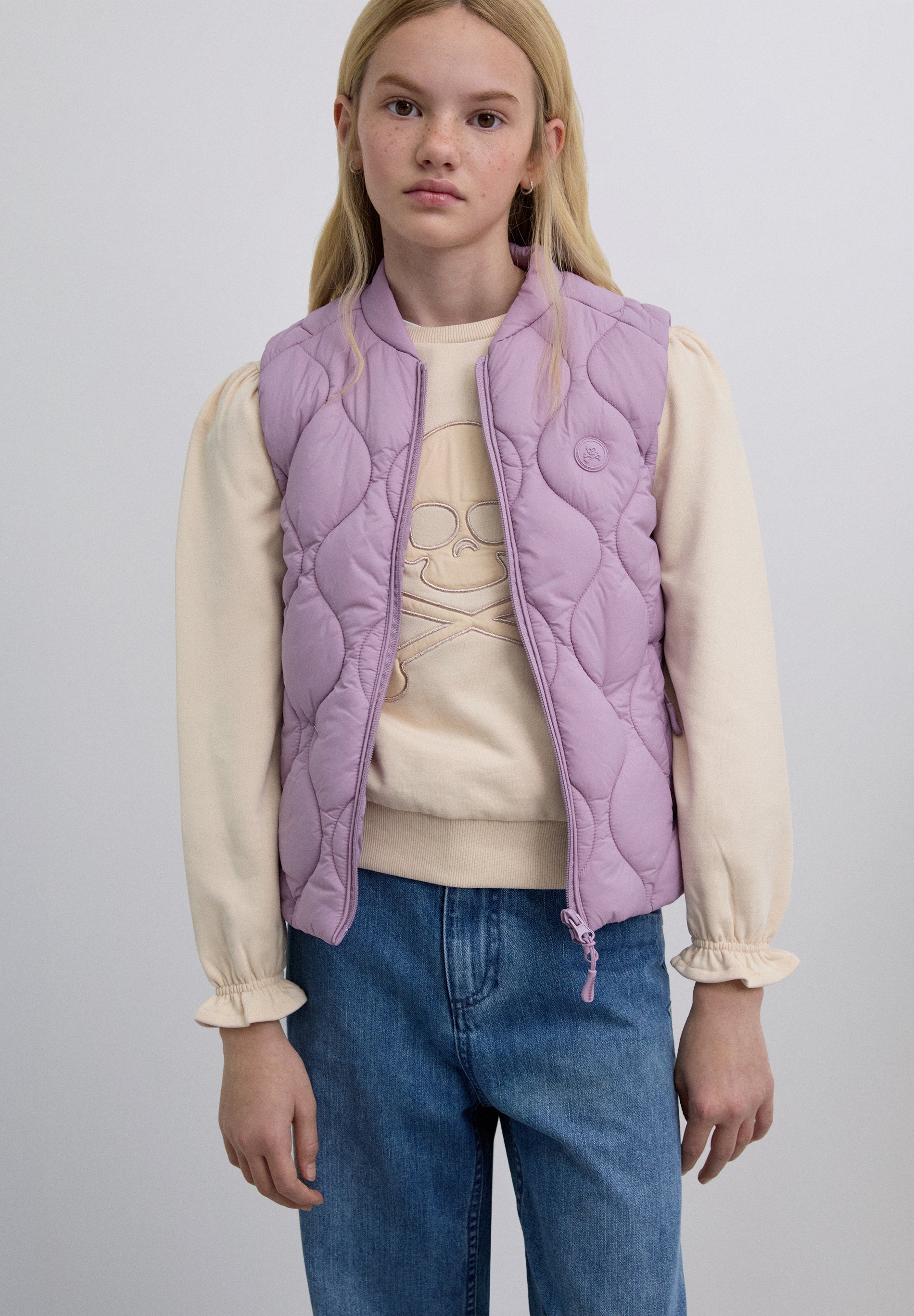 PUFFER VEST WITH SKULL