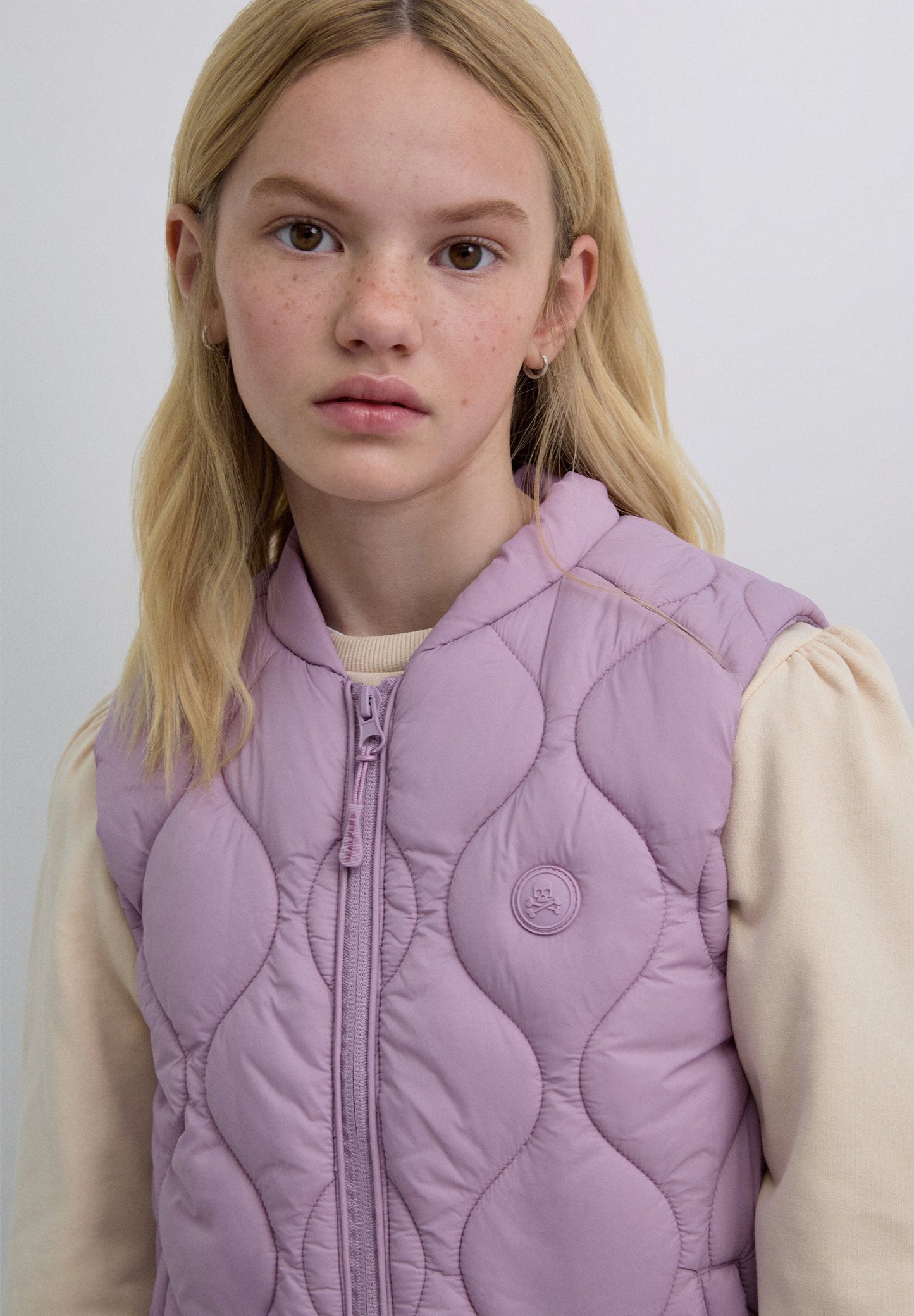 PUFFER VEST WITH SKULL