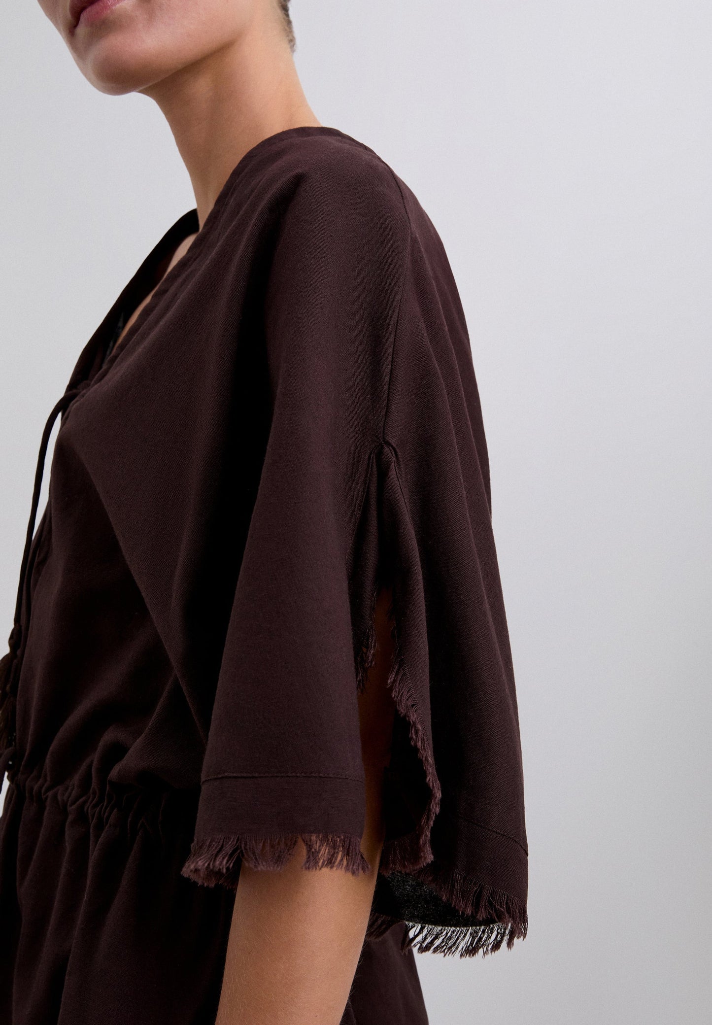 PLAYSUIT WITH FRINGING AND TIE-UP DETAILS