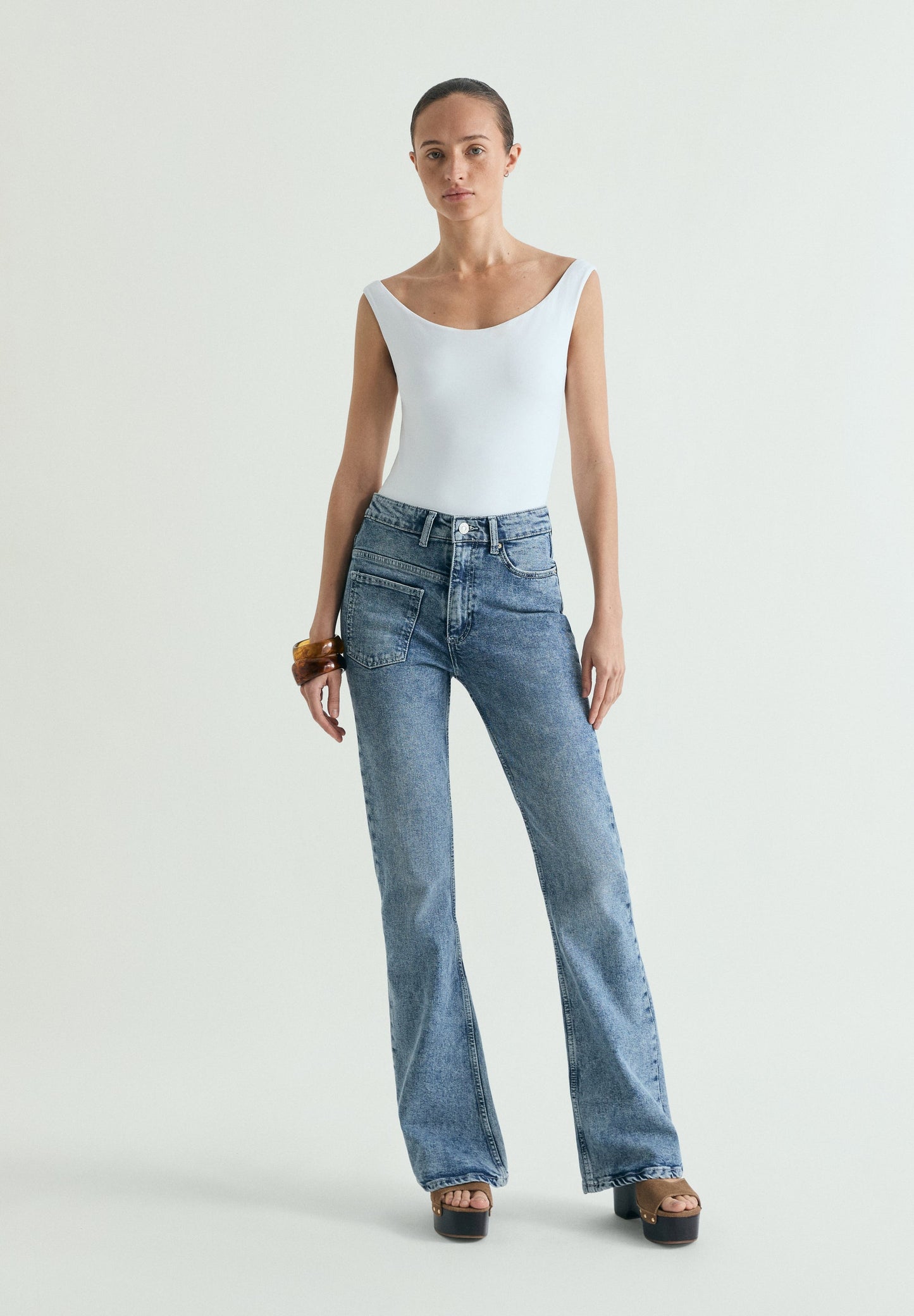 ASYMMETRIC POCKET JEANS