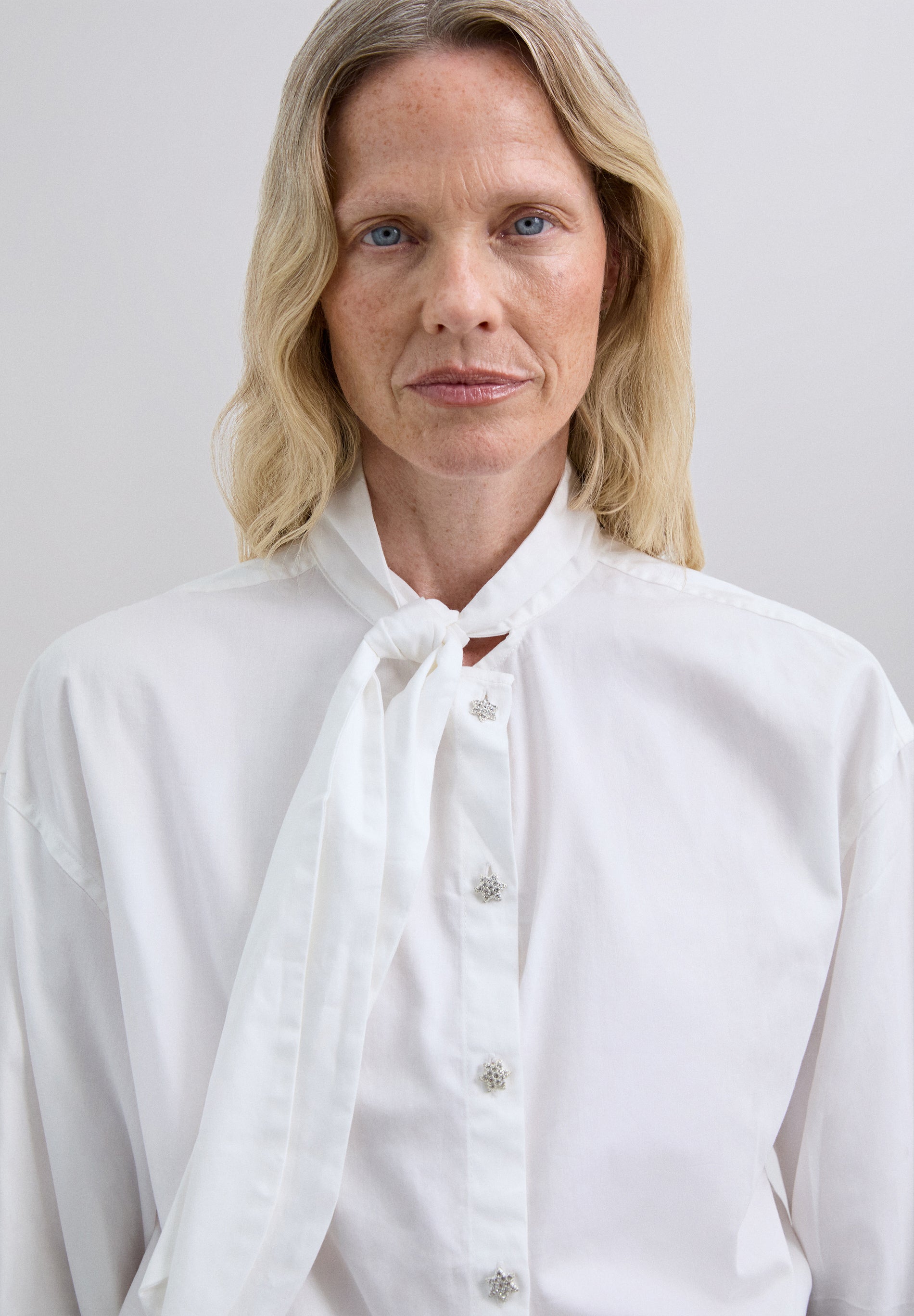 SHIRT WITH BOW DETAIL