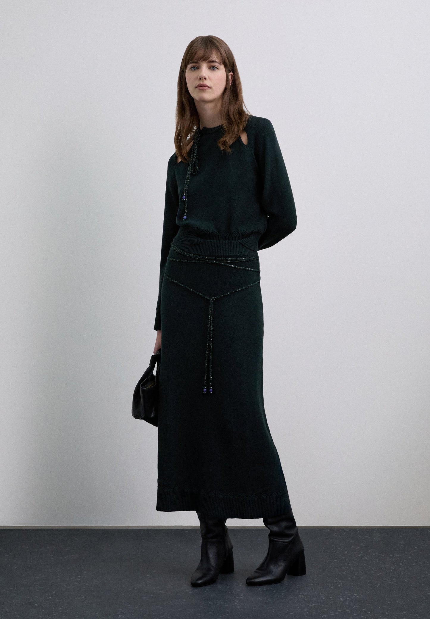 SWEATER WITH CUTOUTS AND TIE DETAIL