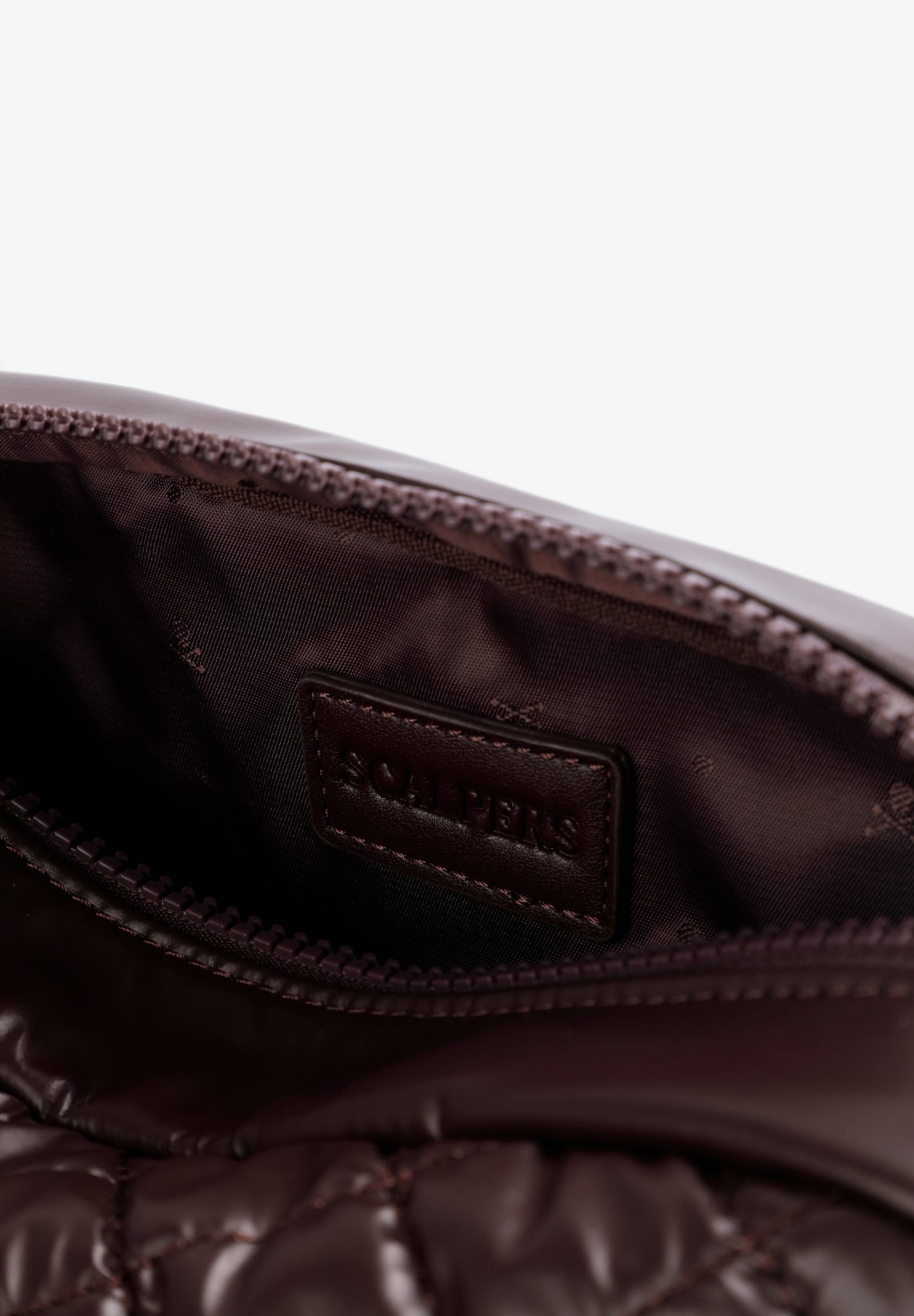 QUILTED TOILETRY BAG WITH SKULL