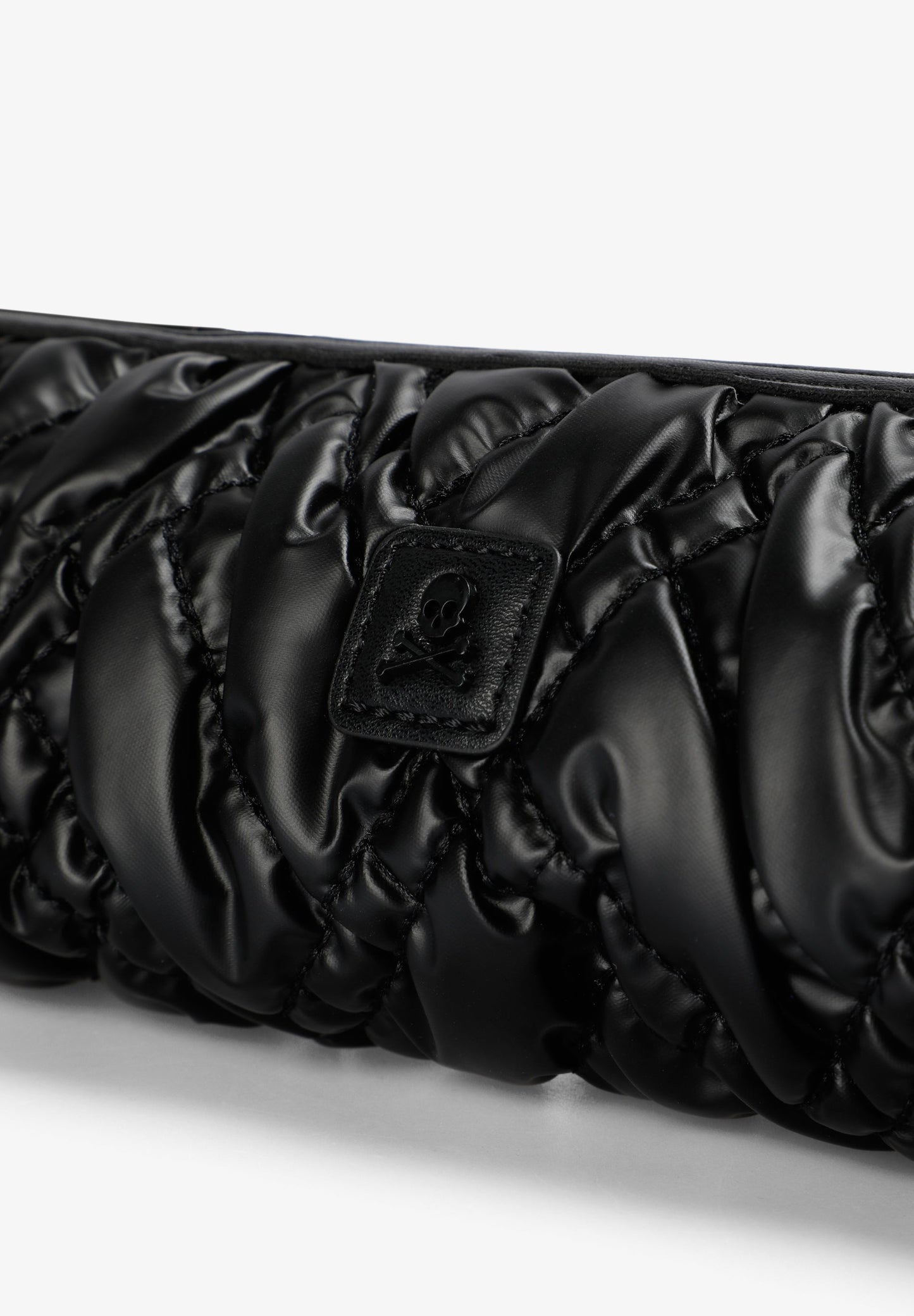 QUILTED TOILETRY BAG WITH SKULL