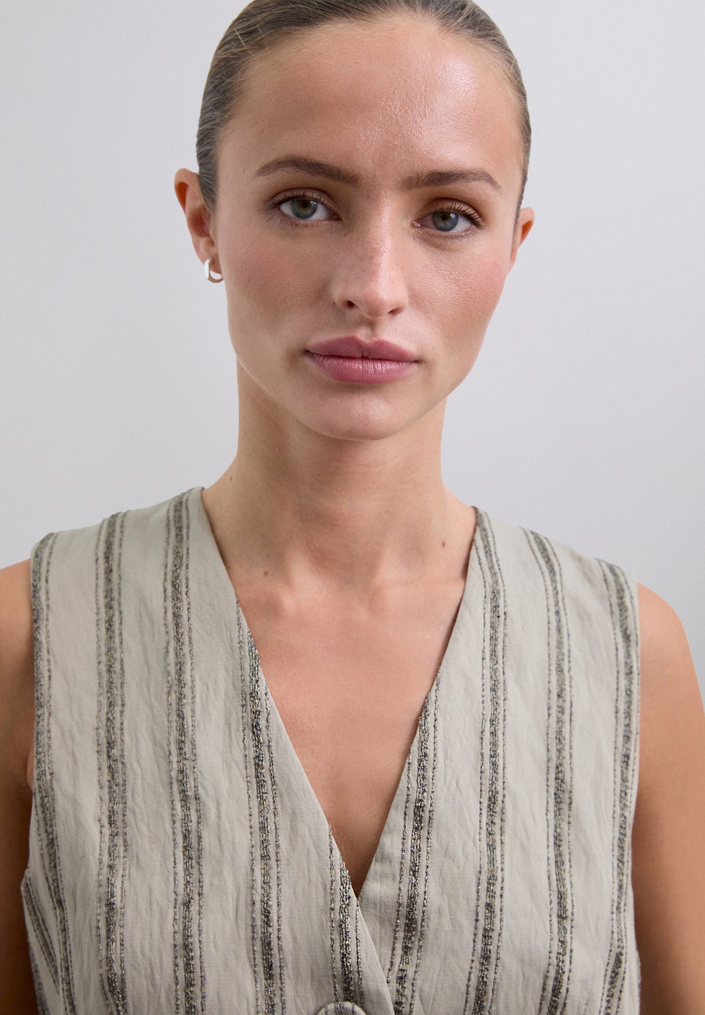 STRIPED WAISTCOAT WITH METALLIC DETAILS