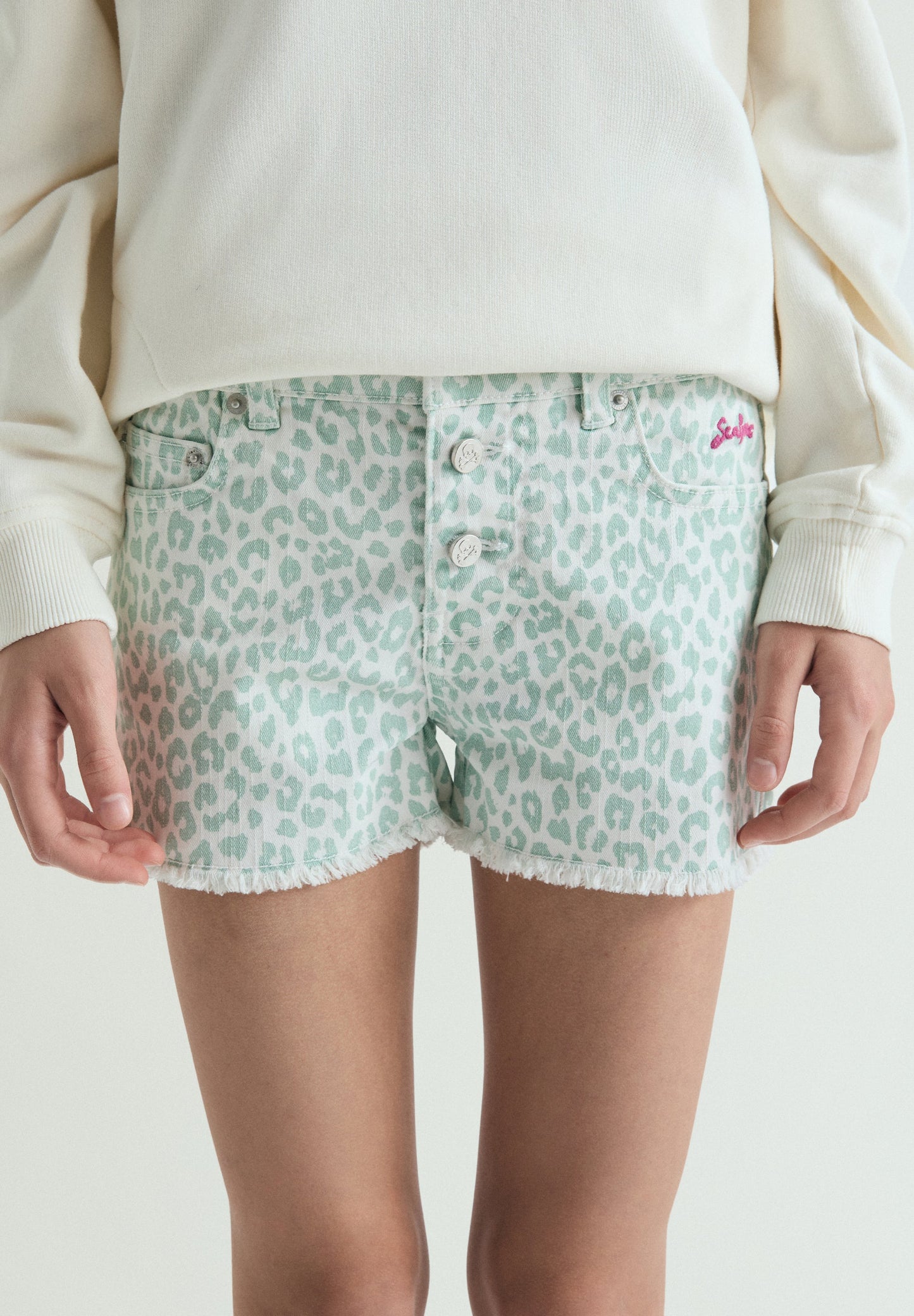 ANIMAL PRINT SHORTS WITH BUTTON