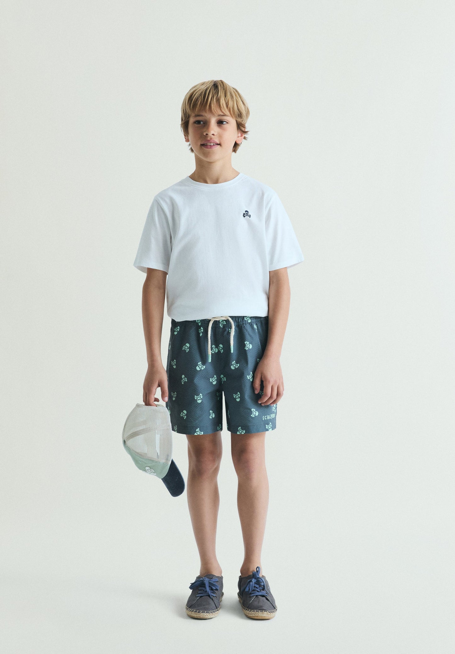 SWIMMING TRUNKS WITH SKULL PRINT