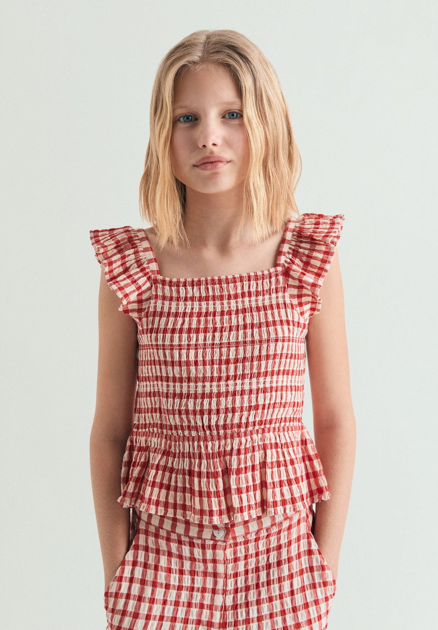SMOCKED GINGHAM TOP