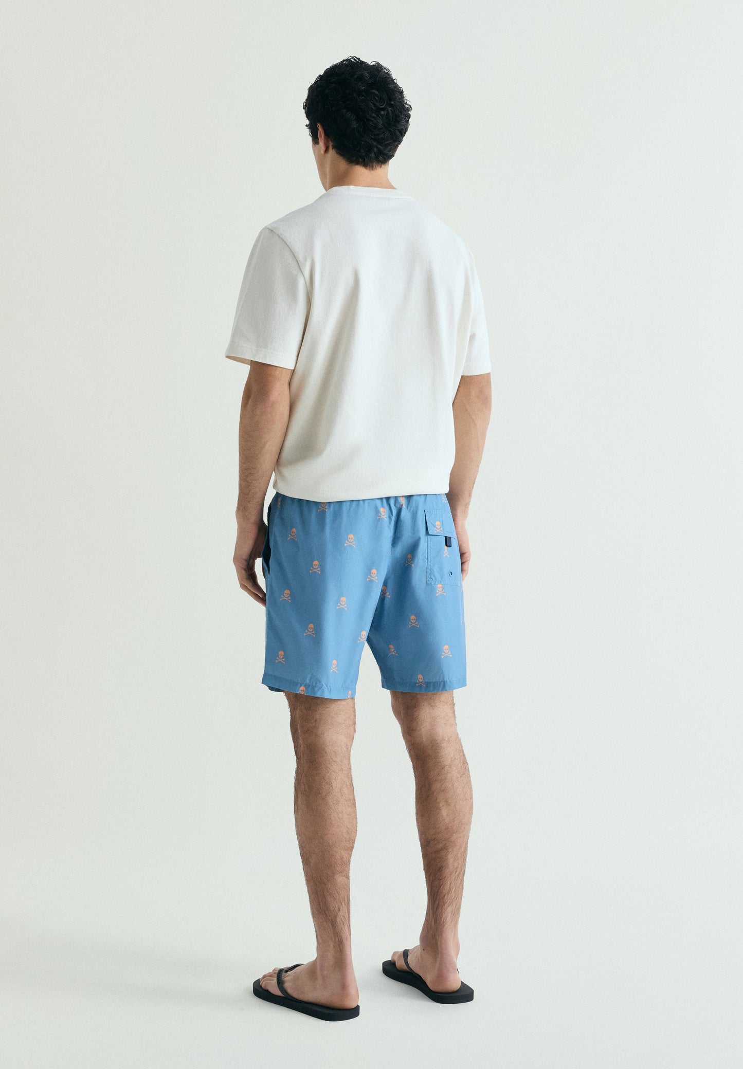 CONTRAST SKULL SWIMMING TRUNKS