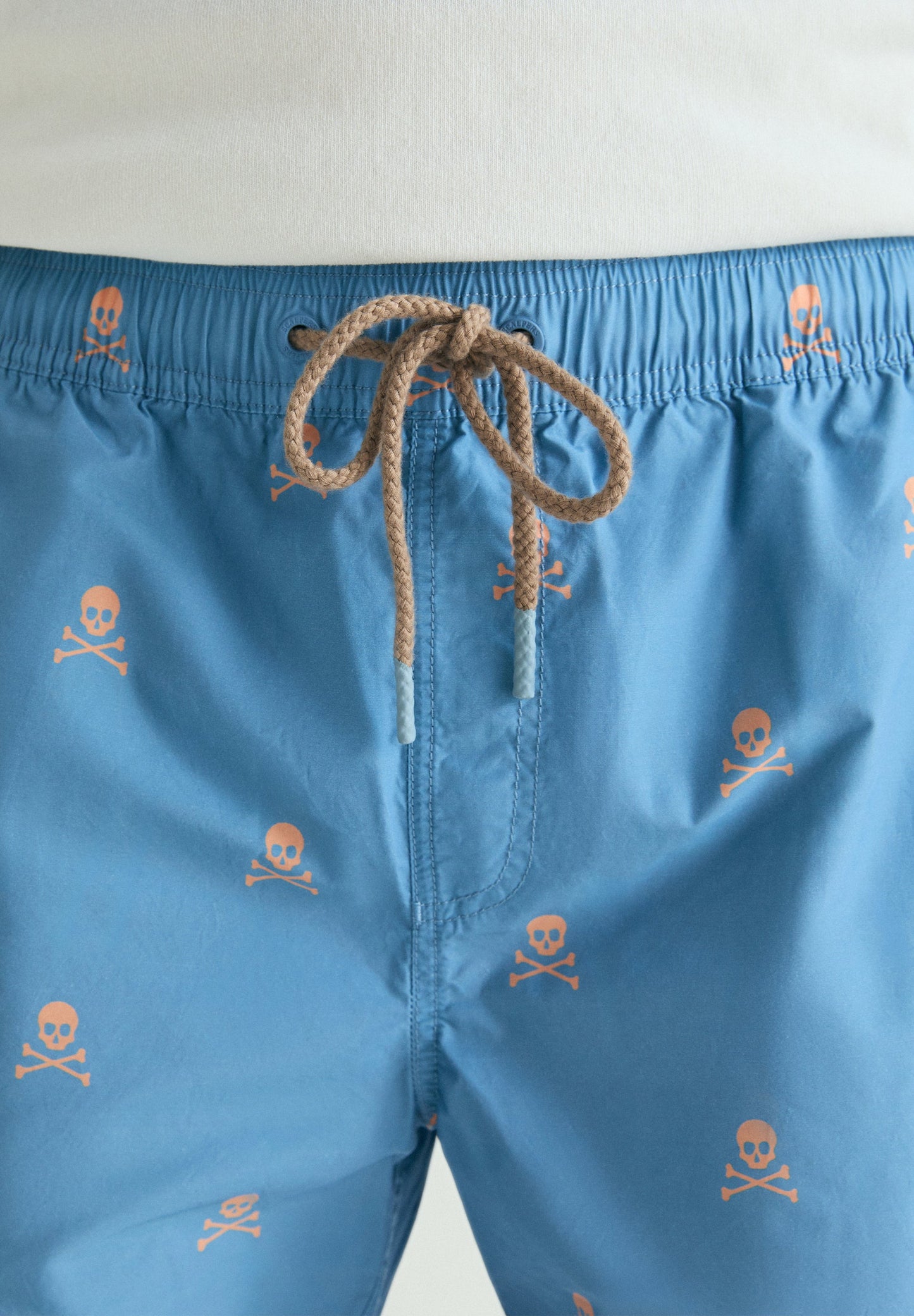 CONTRAST SKULL SWIMMING TRUNKS