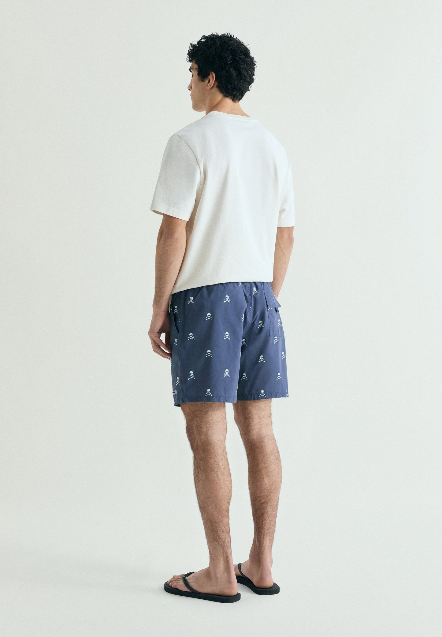 CONTRAST SKULL SWIMMING TRUNKS