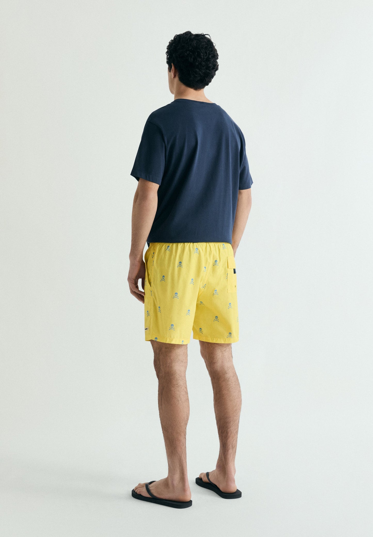 CONTRAST SKULL SWIMMING TRUNKS