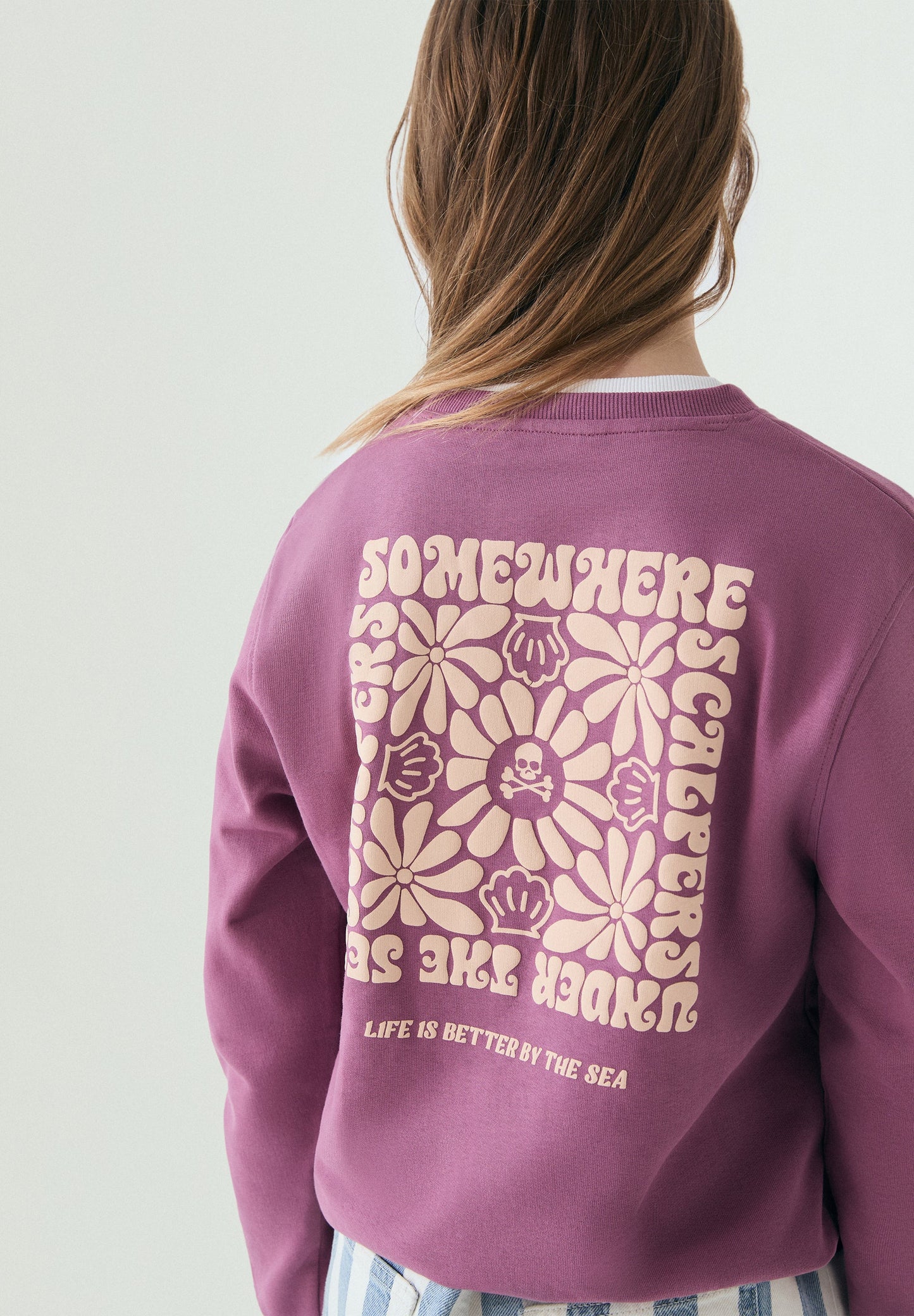 ADJUSTABLE DRAWSTRING SWEATSHIRT