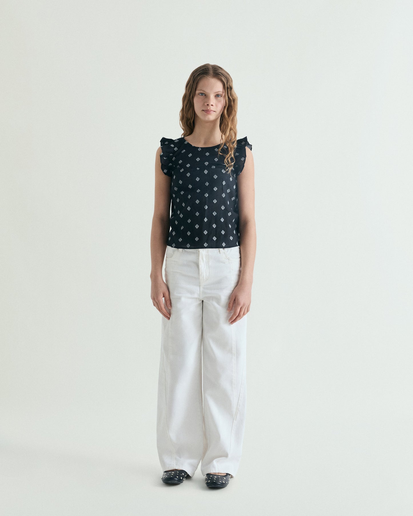 SLEEVELESS JACQUARD BLOUSE