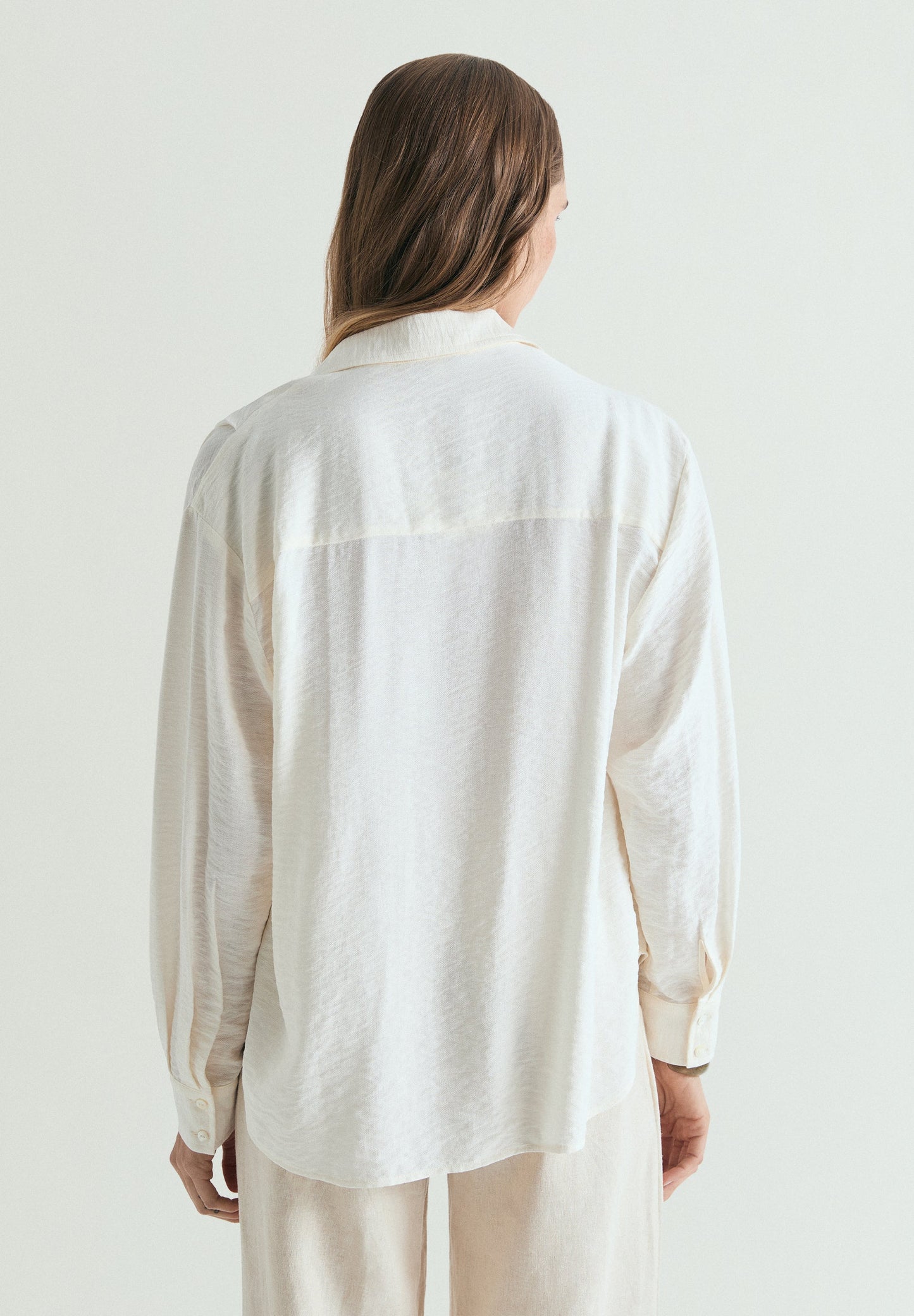 FLOWING PLEATED SHIRT