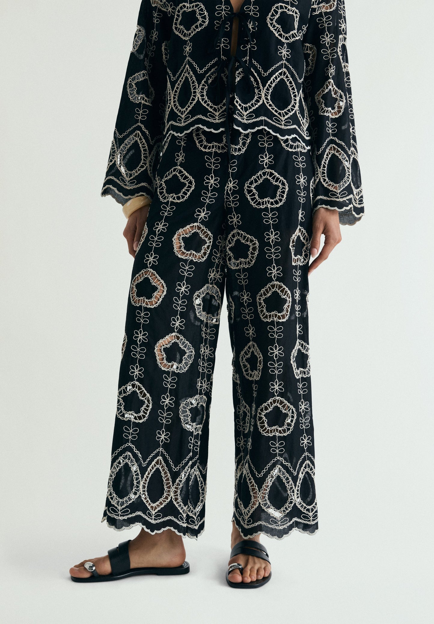 TROUSERS WITH CONTRAST EMBROIDERY