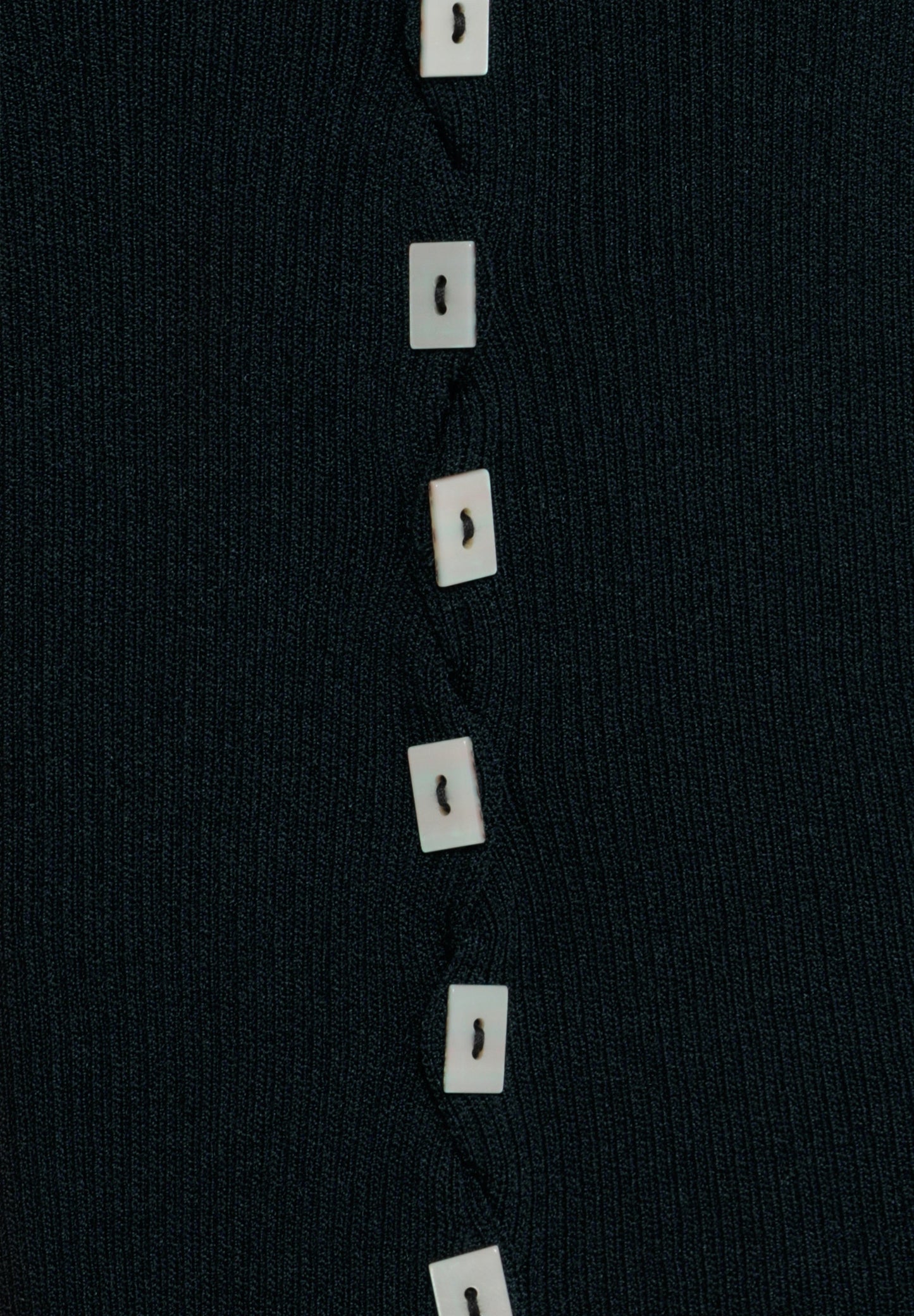 ASYMMETRIC KNIT TOP WITH APPLIQUÉS