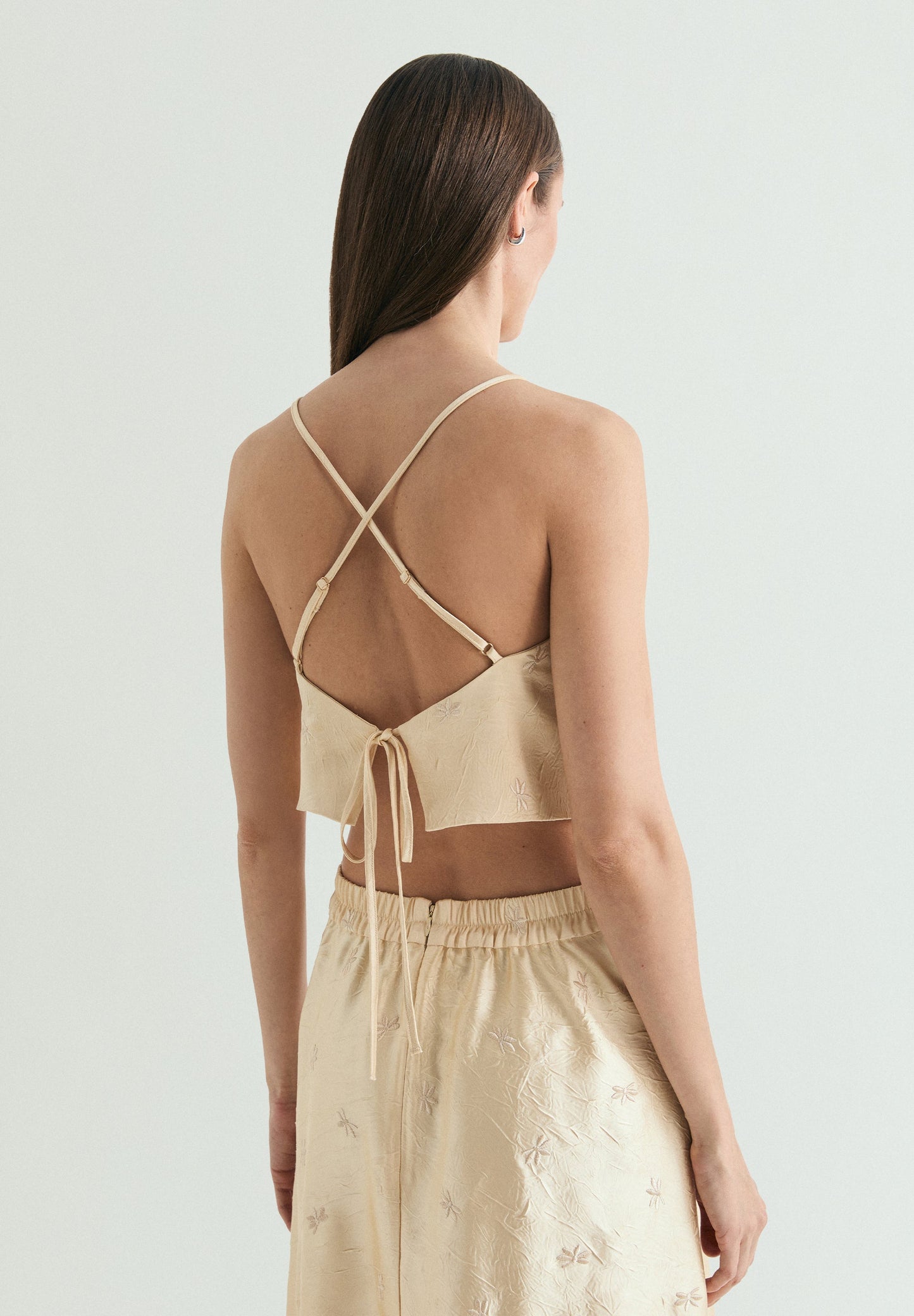 RUFFLED HALTER TOP WITH EMBROIDERY