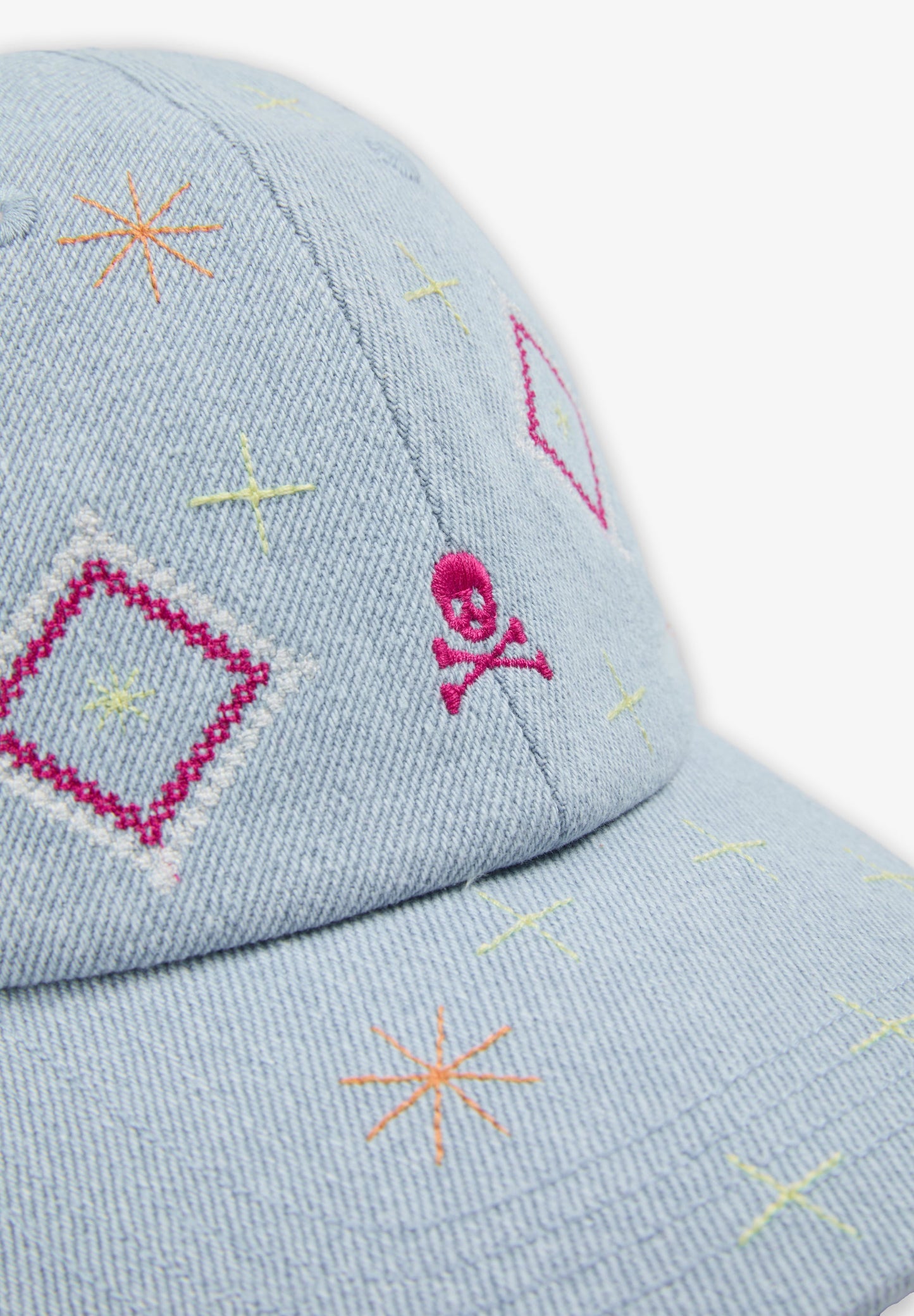CAP WITH EMBROIDERED DETAILS