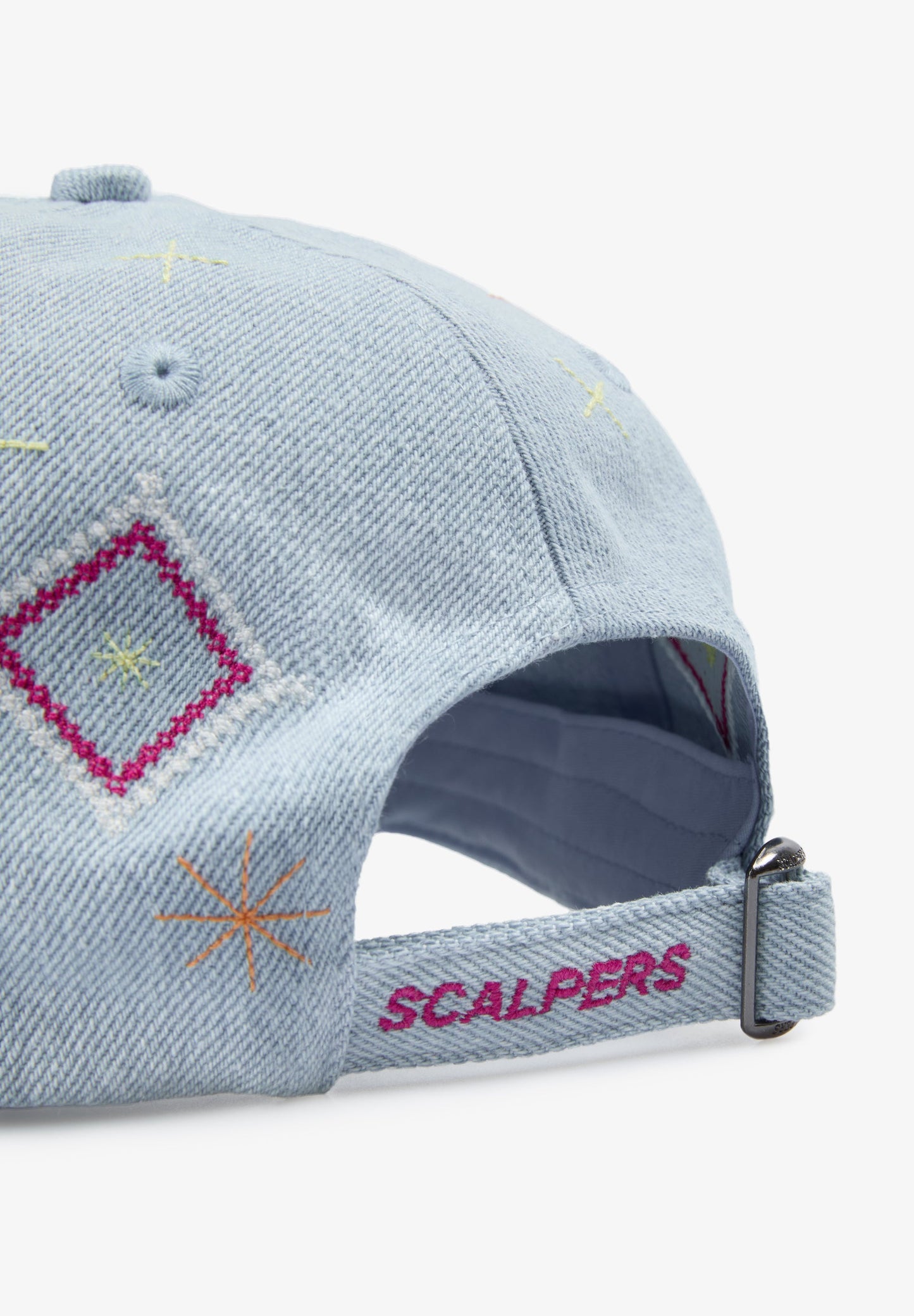 CAP WITH EMBROIDERED DETAILS