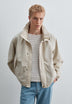 TECHNICAL JACKET WITH CONCEALED HOOD