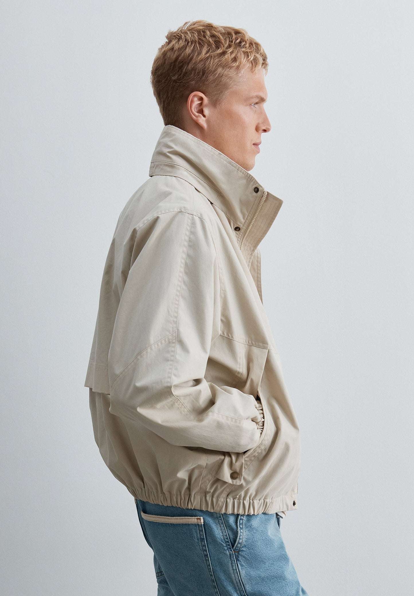 TECHNICAL JACKET WITH CONCEALED HOOD