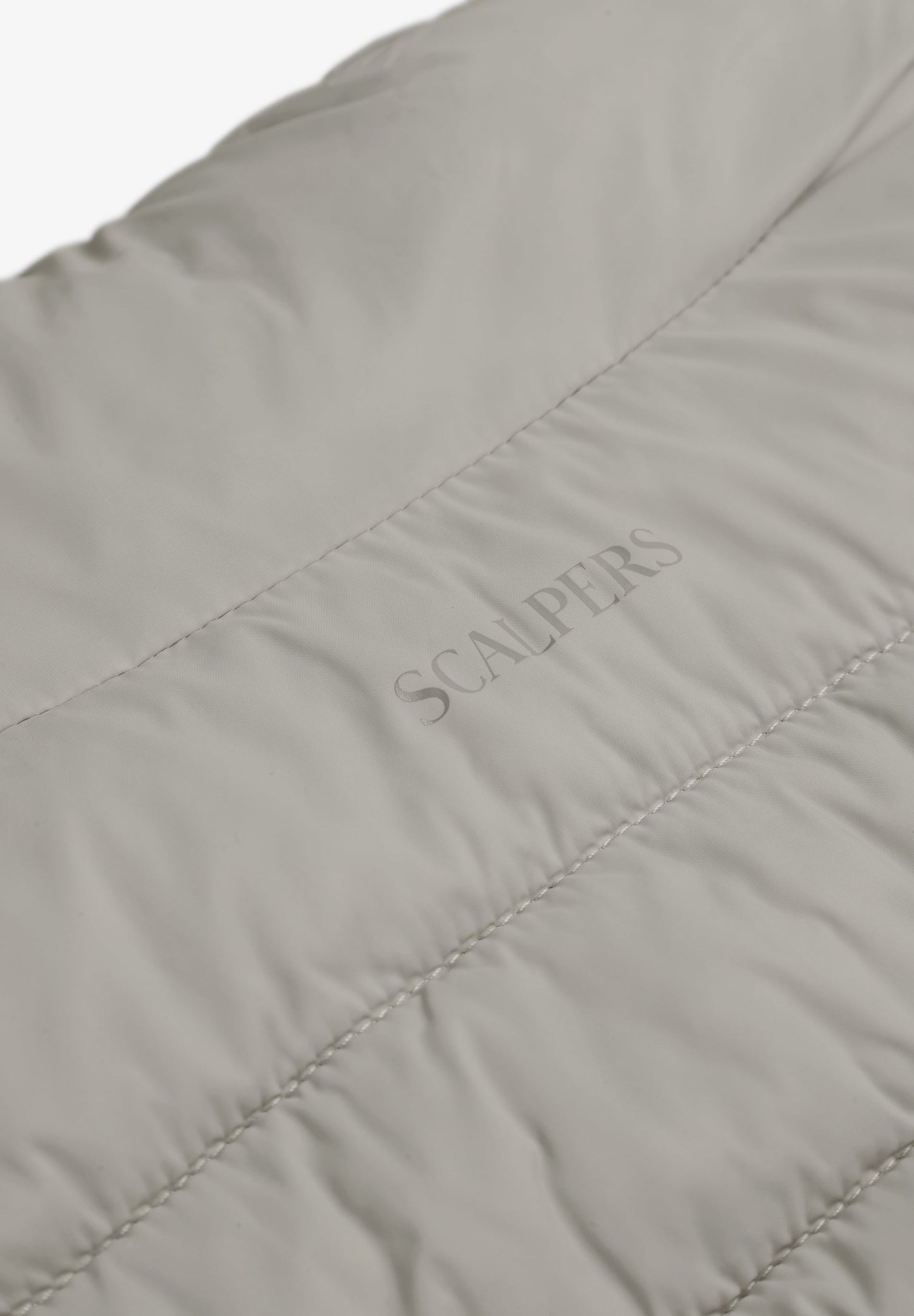 PUFFER JACKET WITH SKULL DETAIL