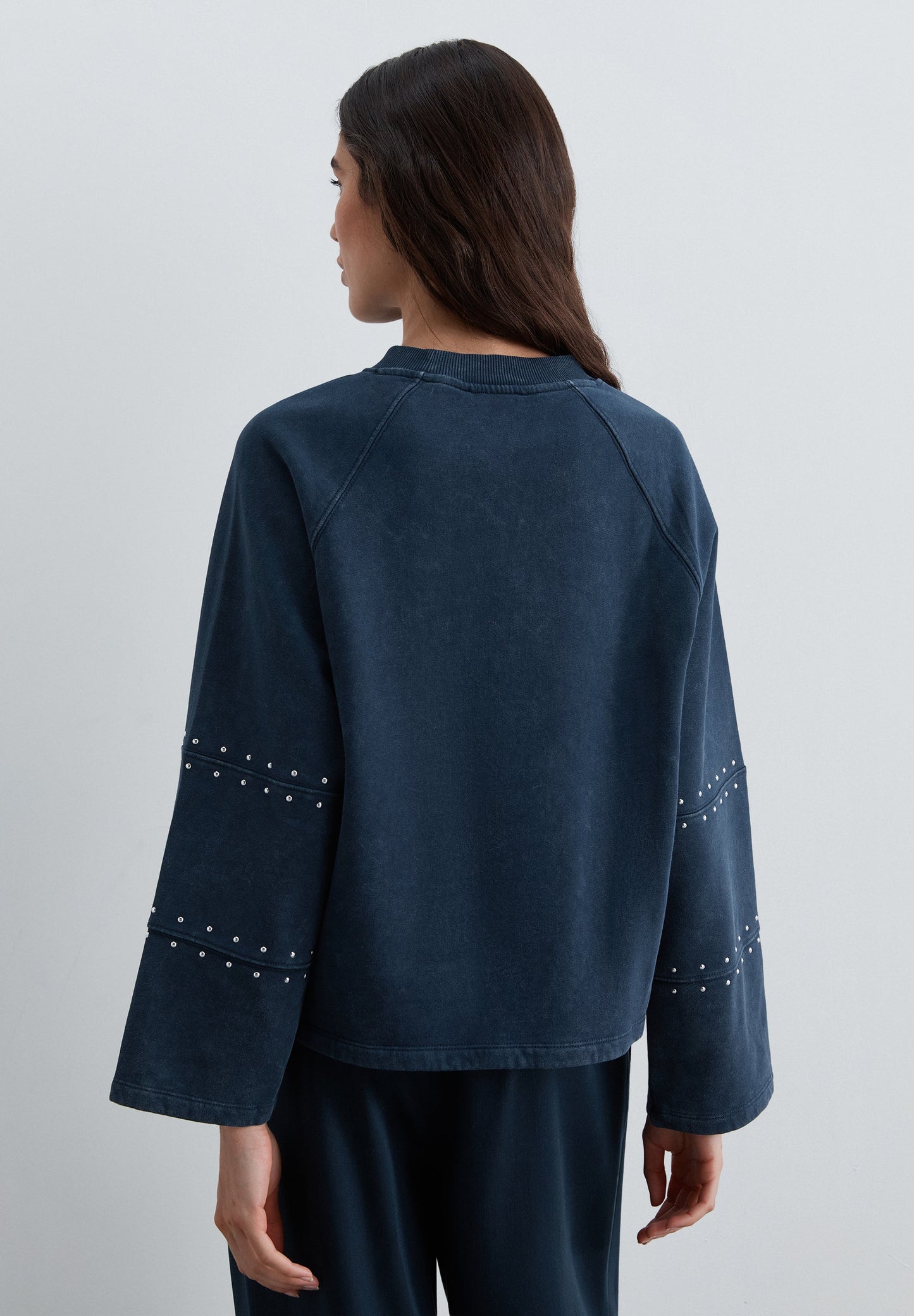 SWEATSHIRT WITH STUDS AND LOGO PATCH