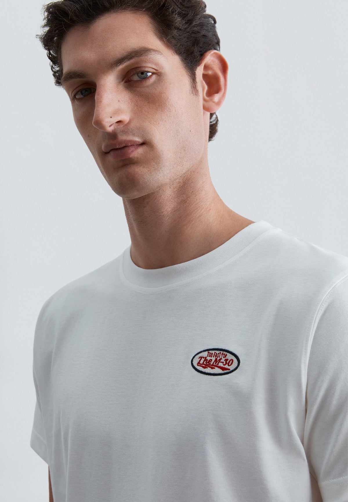 PRINTED T-SHIRT WITH PATCH DETAIL