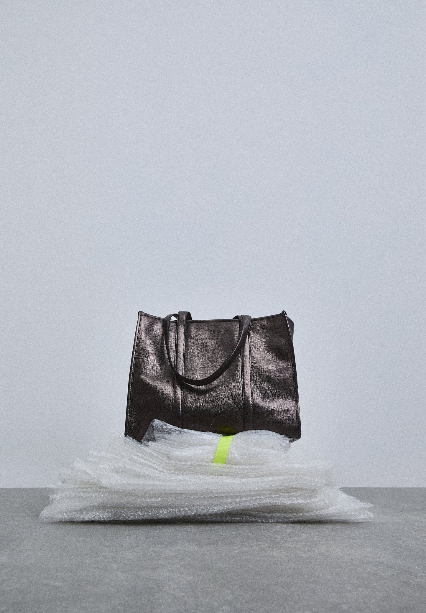 LEATHER AND METALLIC TOTE BAG