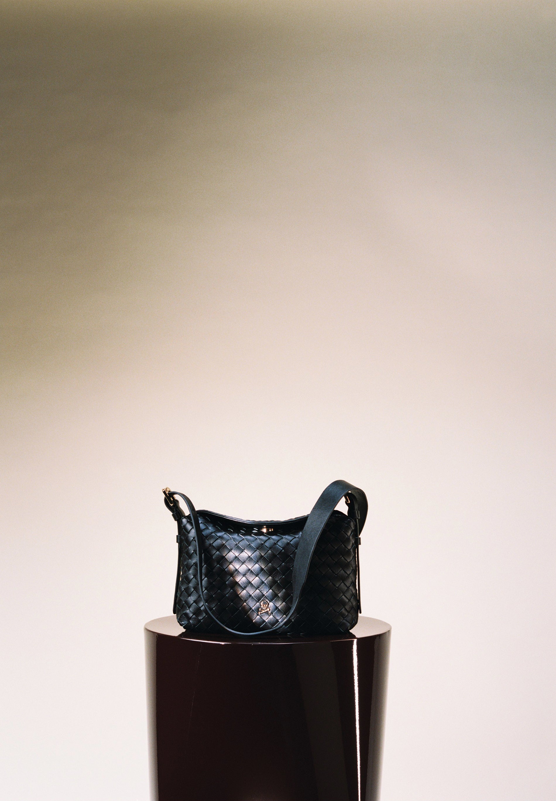 BRAIDED LEATHER CROSSBODY BAG