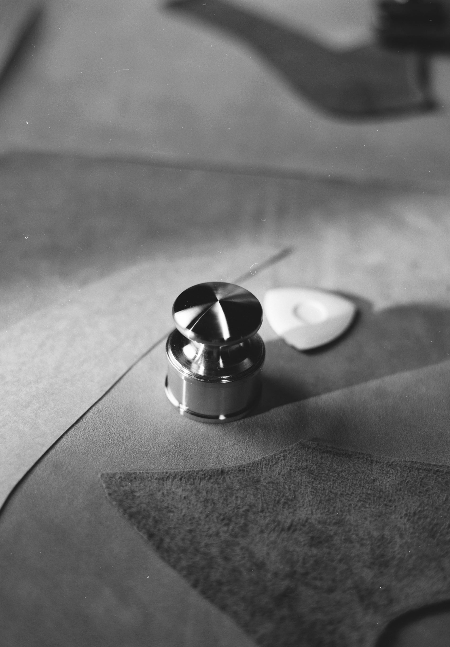 BRAIDED LEATHER CROSSBODY BAG