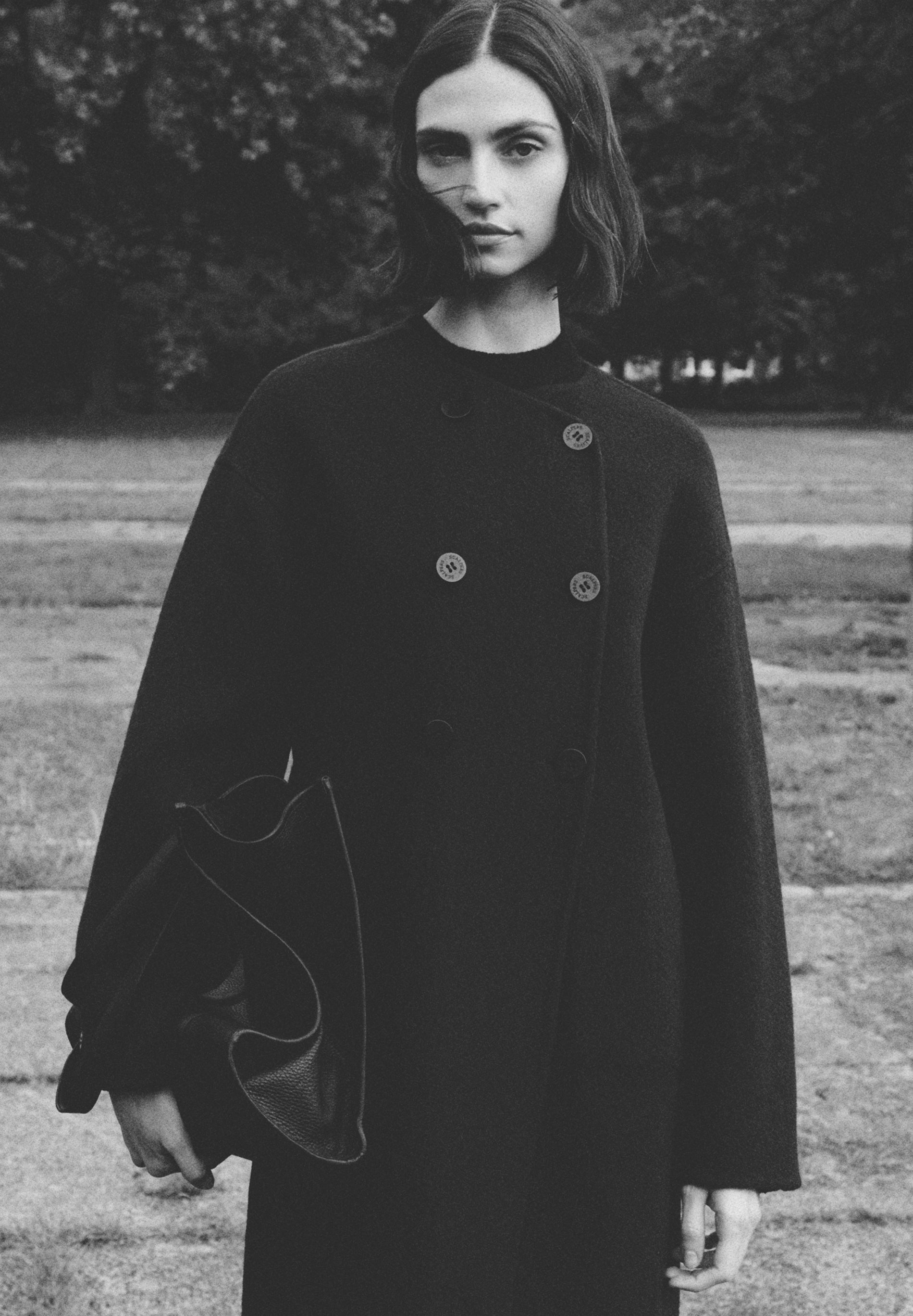 TWEEZIJDIGE JAS VAN WOLMIX