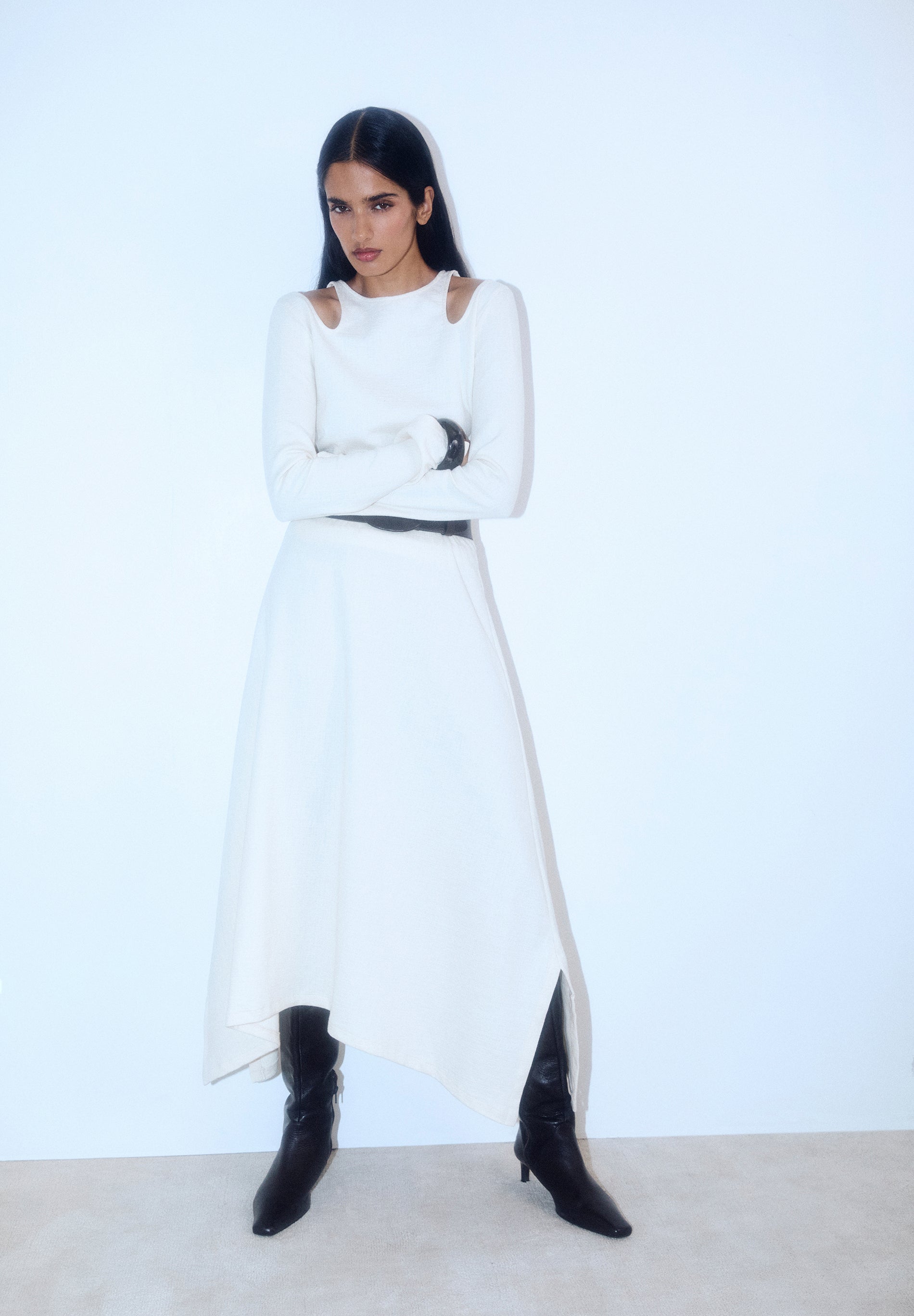 ASYMMETRIC KNIT MIDI SKIRT