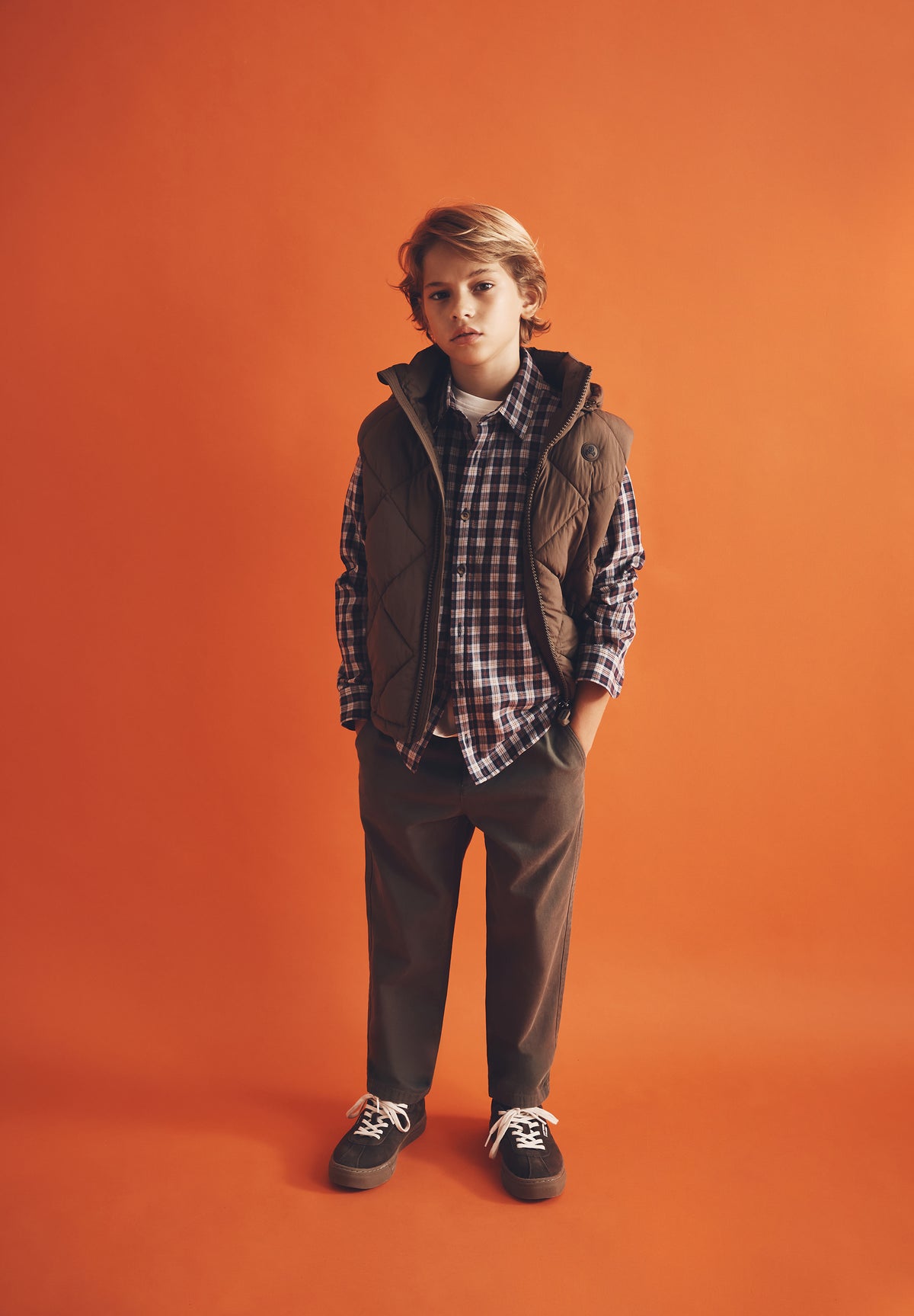 PADDED VEST WITH DETACHABLE HOOD