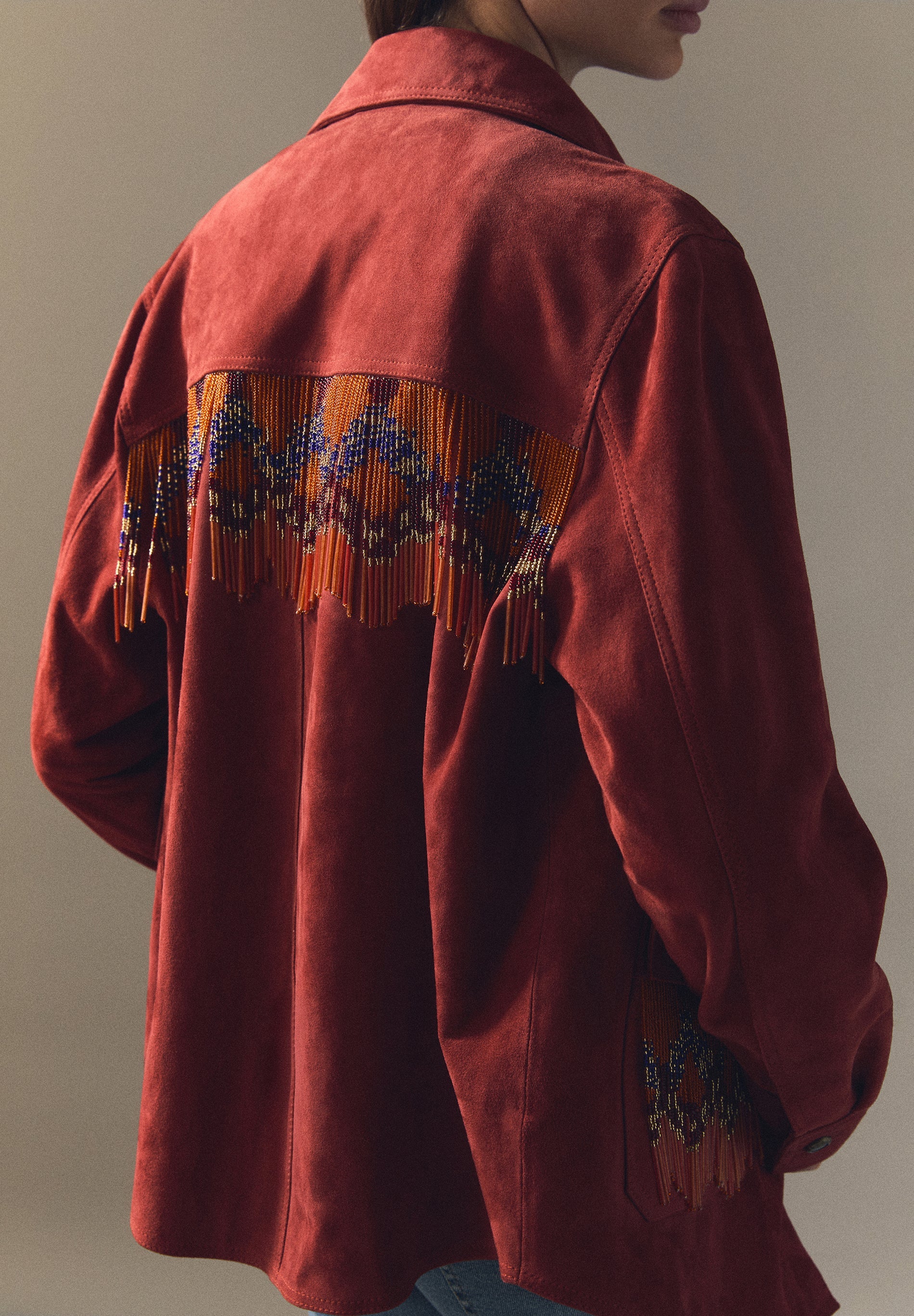 SUEDE JACKET WITH BEADS