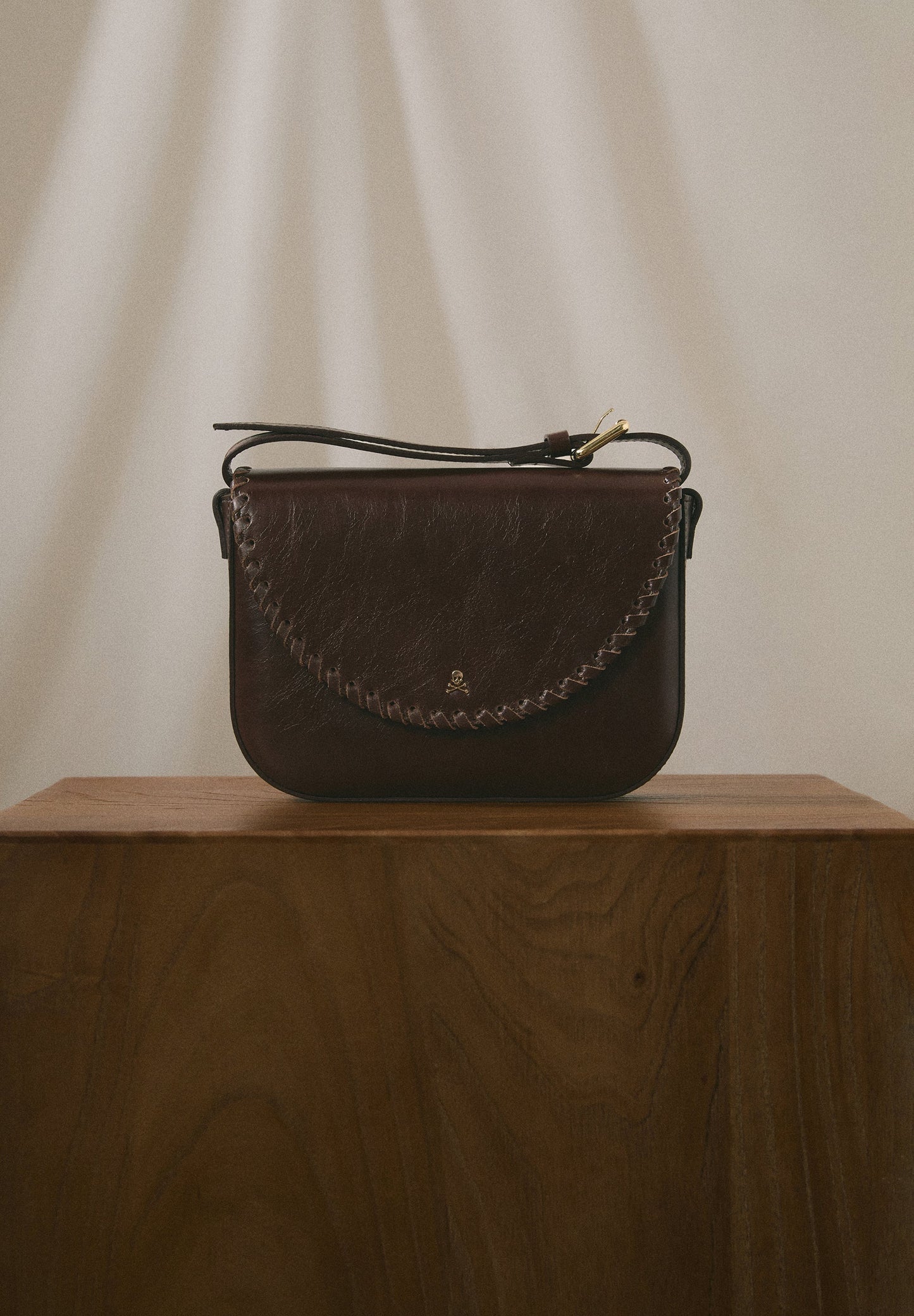 BRAIDED LEATHER CROSSBODY BAG