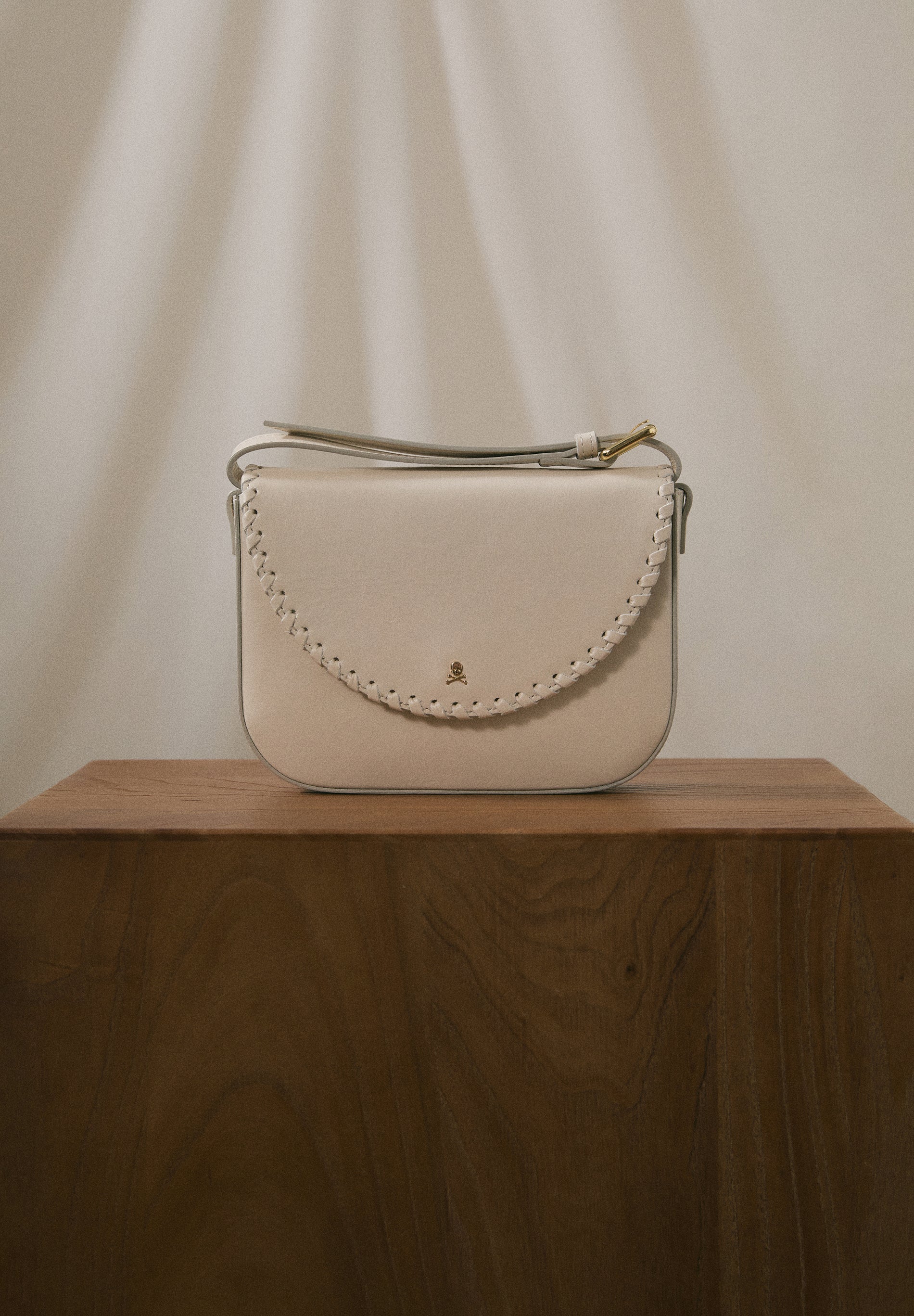 BRAIDED LEATHER CROSSBODY BAG